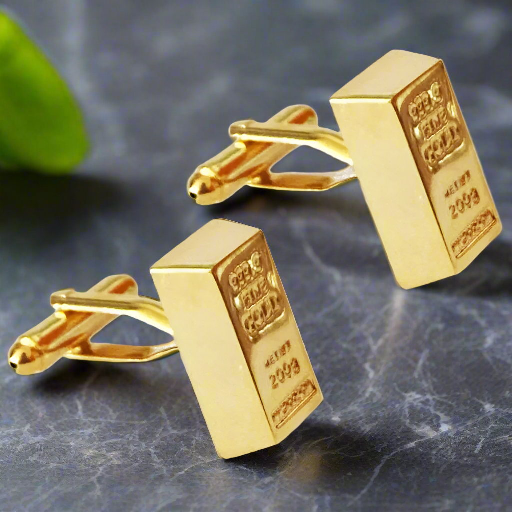 Gold Bar Cufflinks paired with a tailored charcoal suit, showcasing their versatility and elegance.
