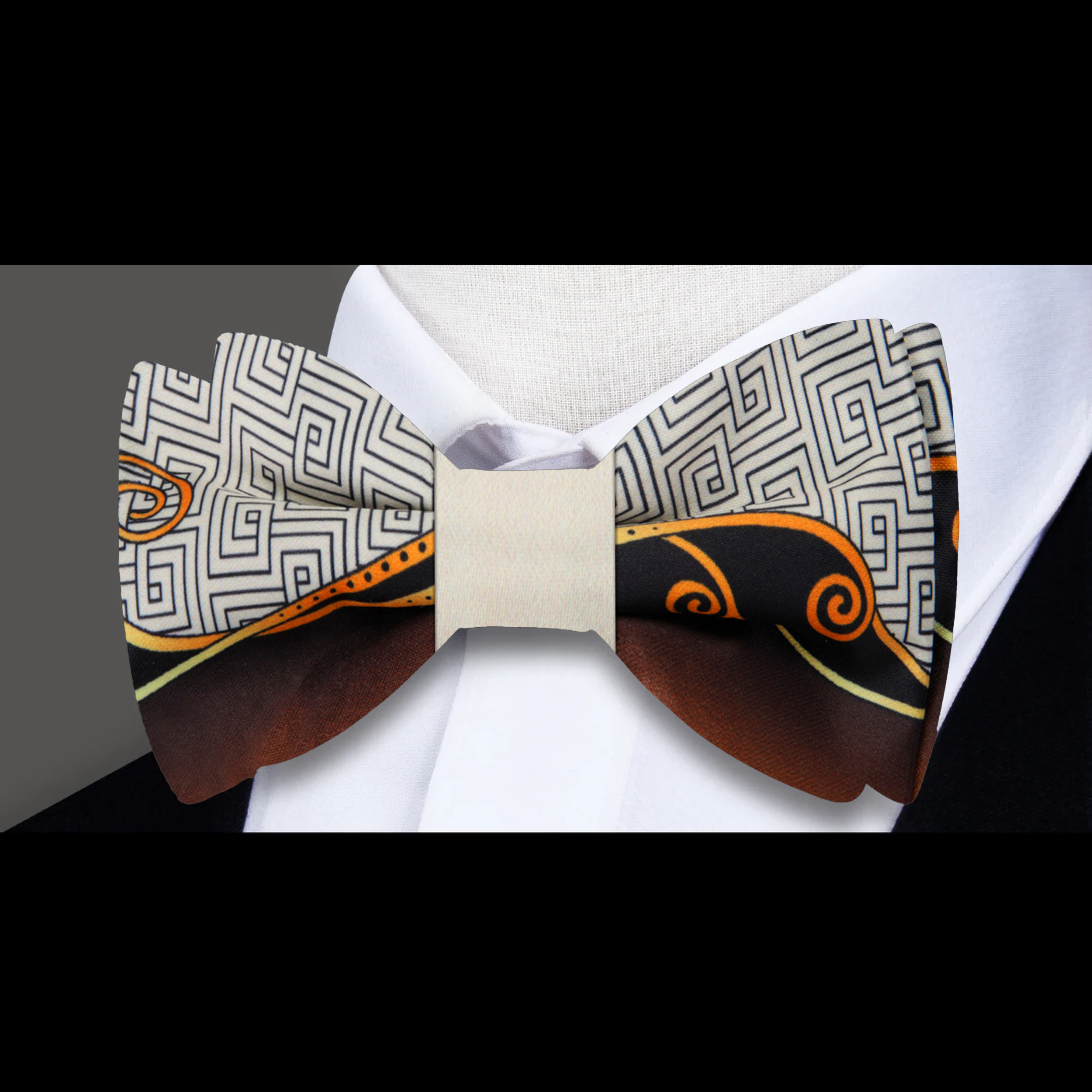 Close-up of the abstract pattern on the luxury mens bow tie and matching pocket square