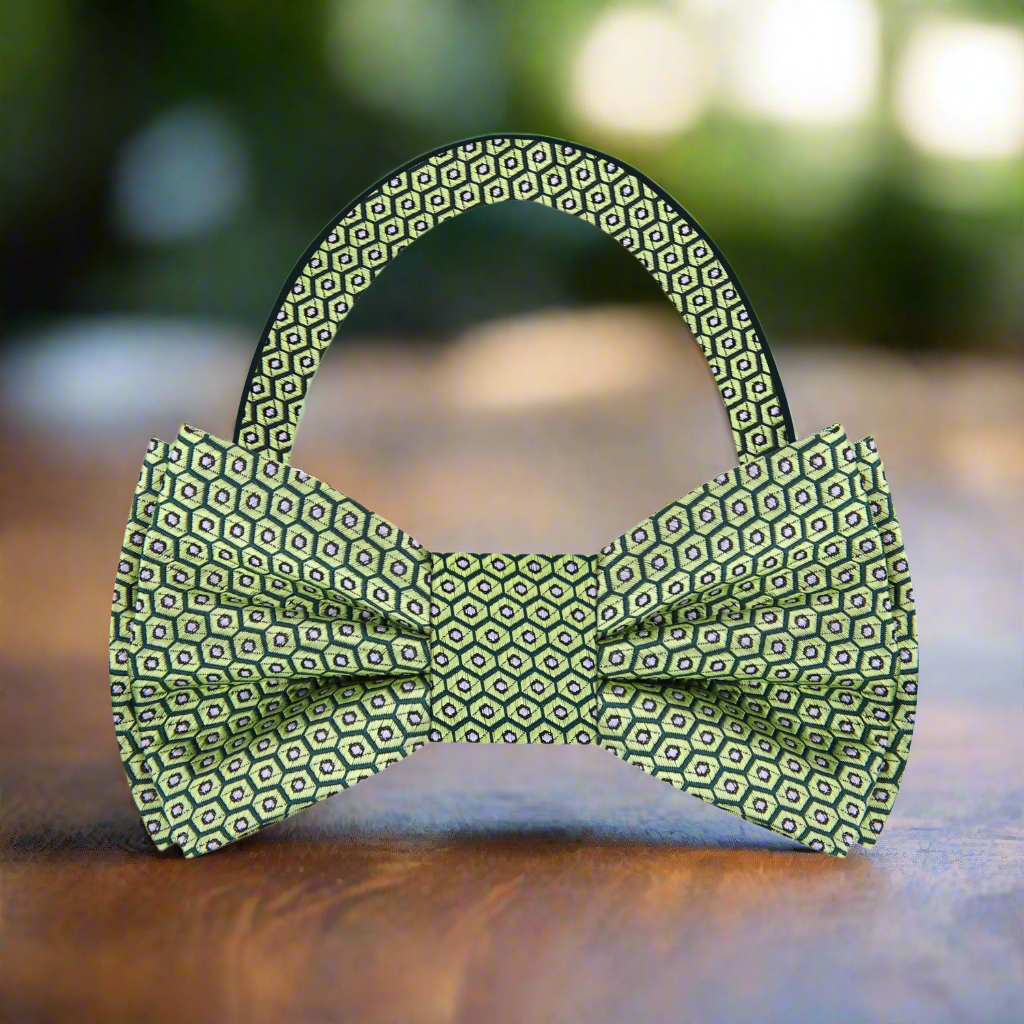 Pre-tied avocado bow tie for formal events displayed with a matching pocket square.
