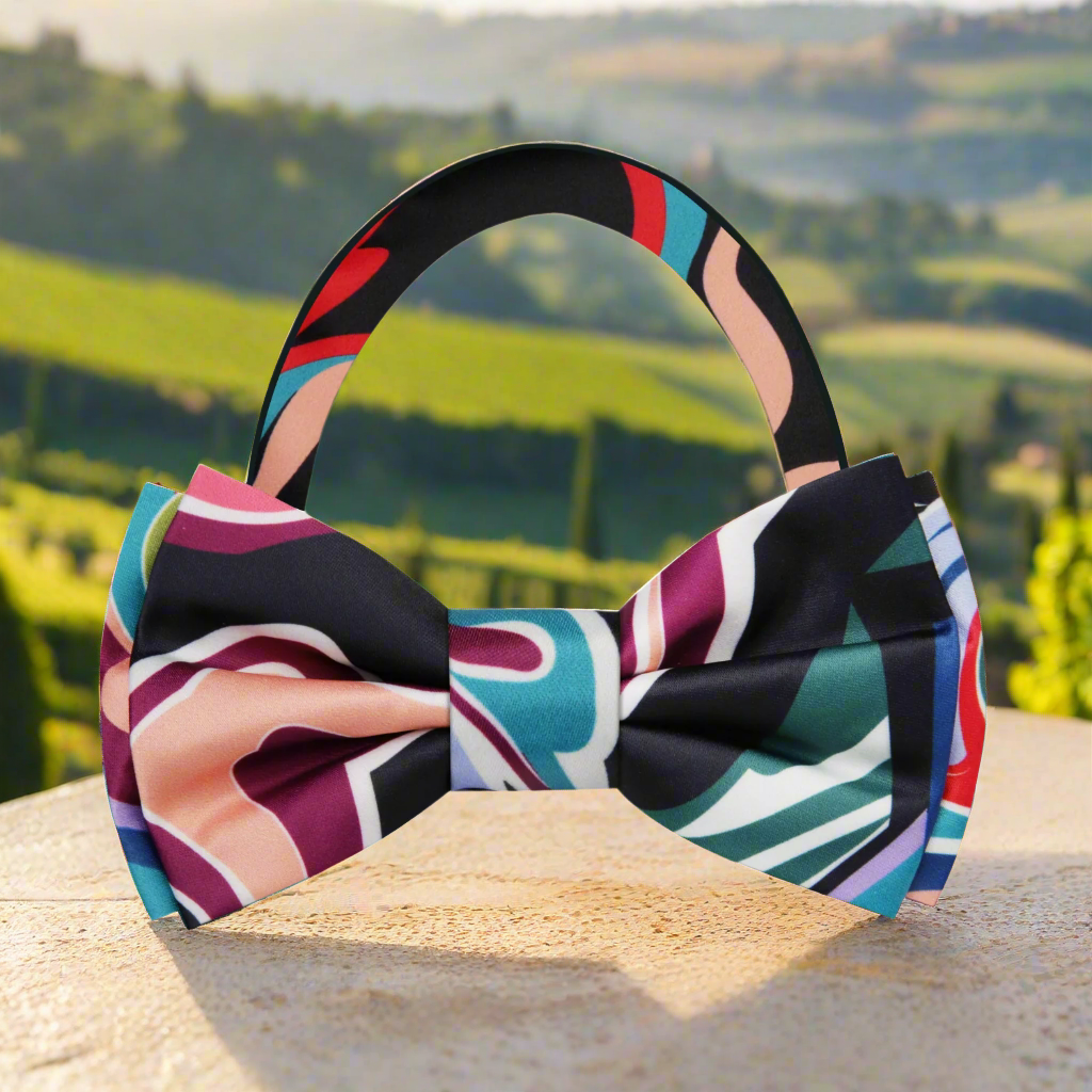 Front view of vibrant abstract silk bow tie in mixed colors.