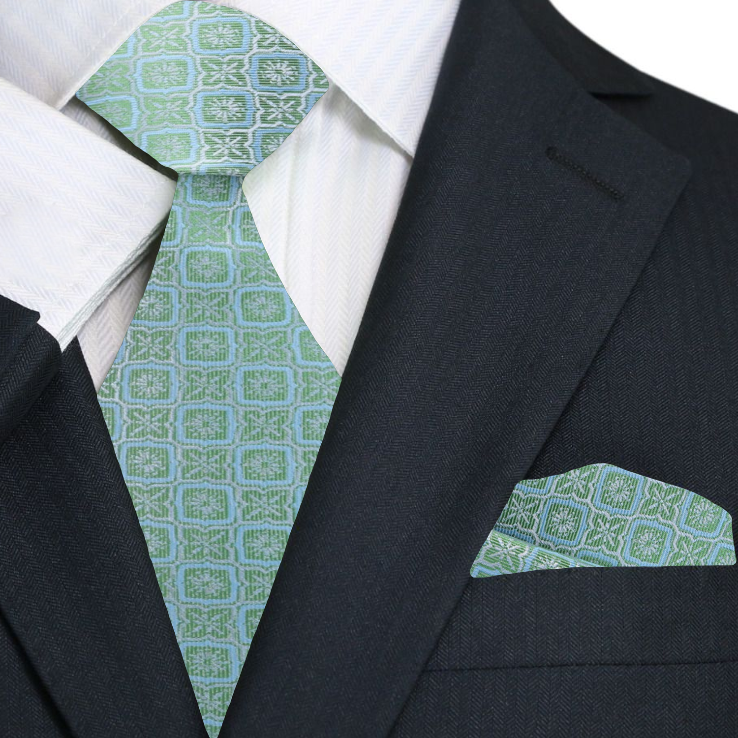 Close-up of geometric pattern silk necktie in peach pink on a display mannequin