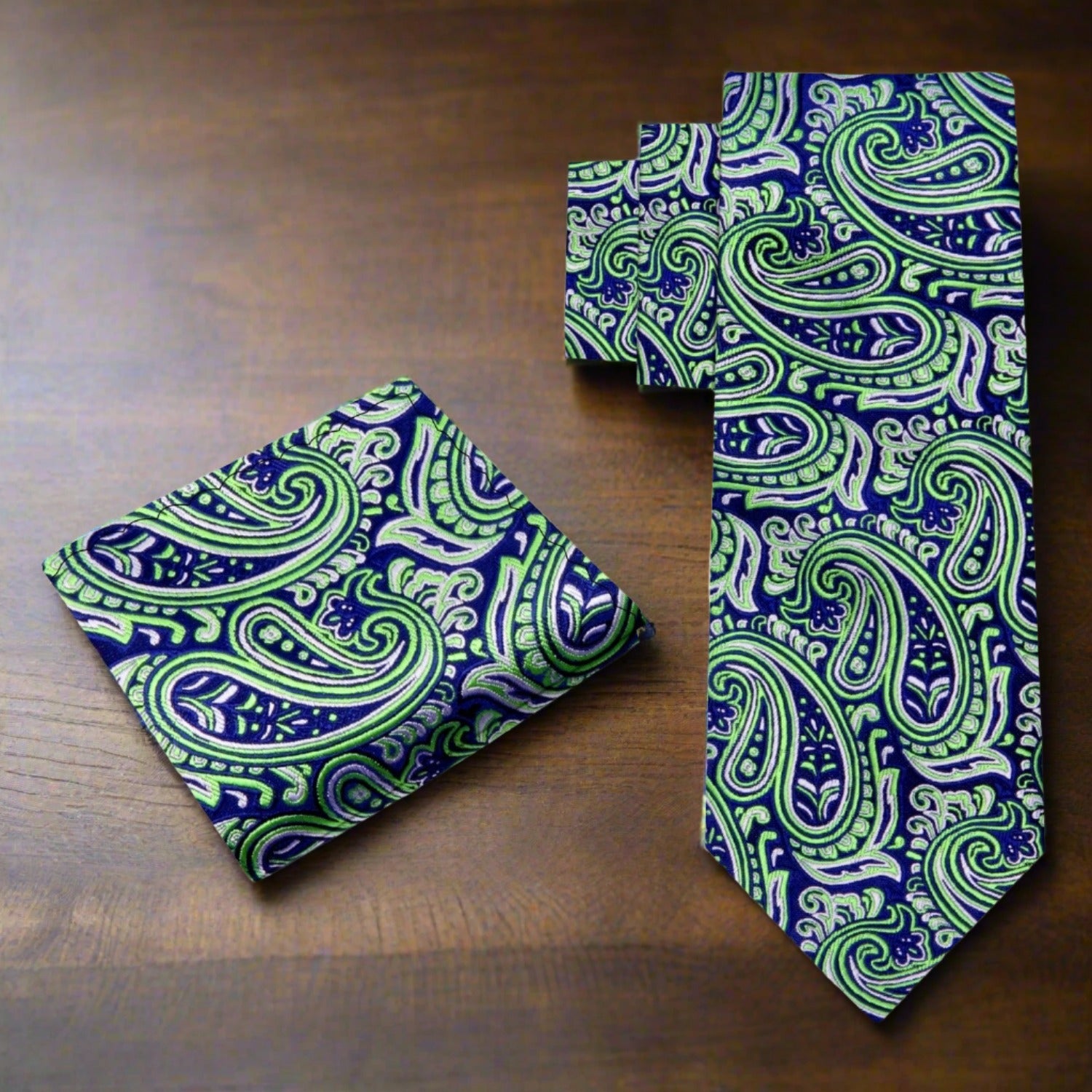 Model wearing the silk paisley tie with matching pocket square for wedding attire