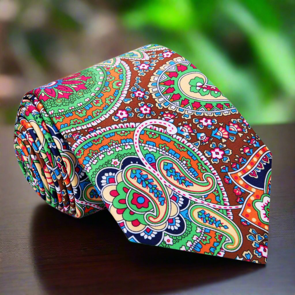 Vibrant paisley silk tie in brown, blue, and green colors perfect for formal occasions