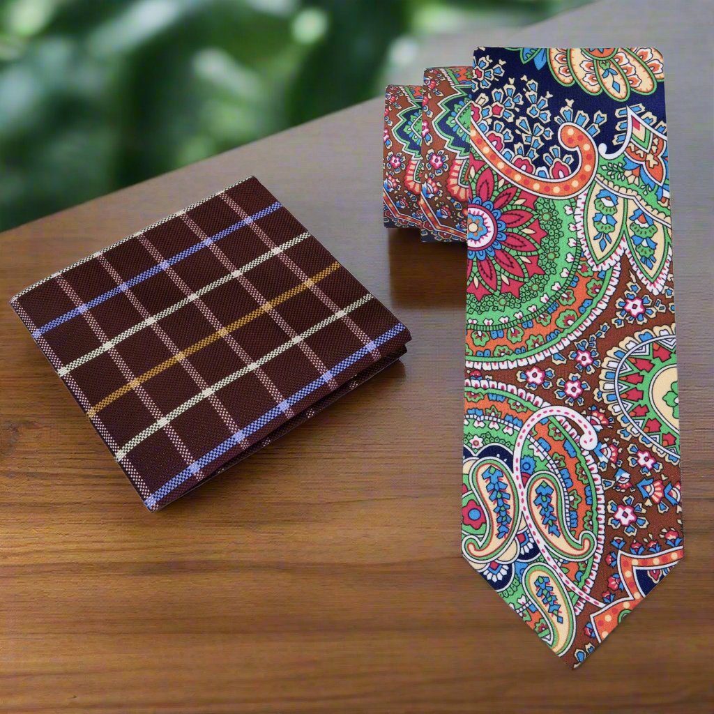 Mens silk tie with intricate paisley pattern styled with a suit