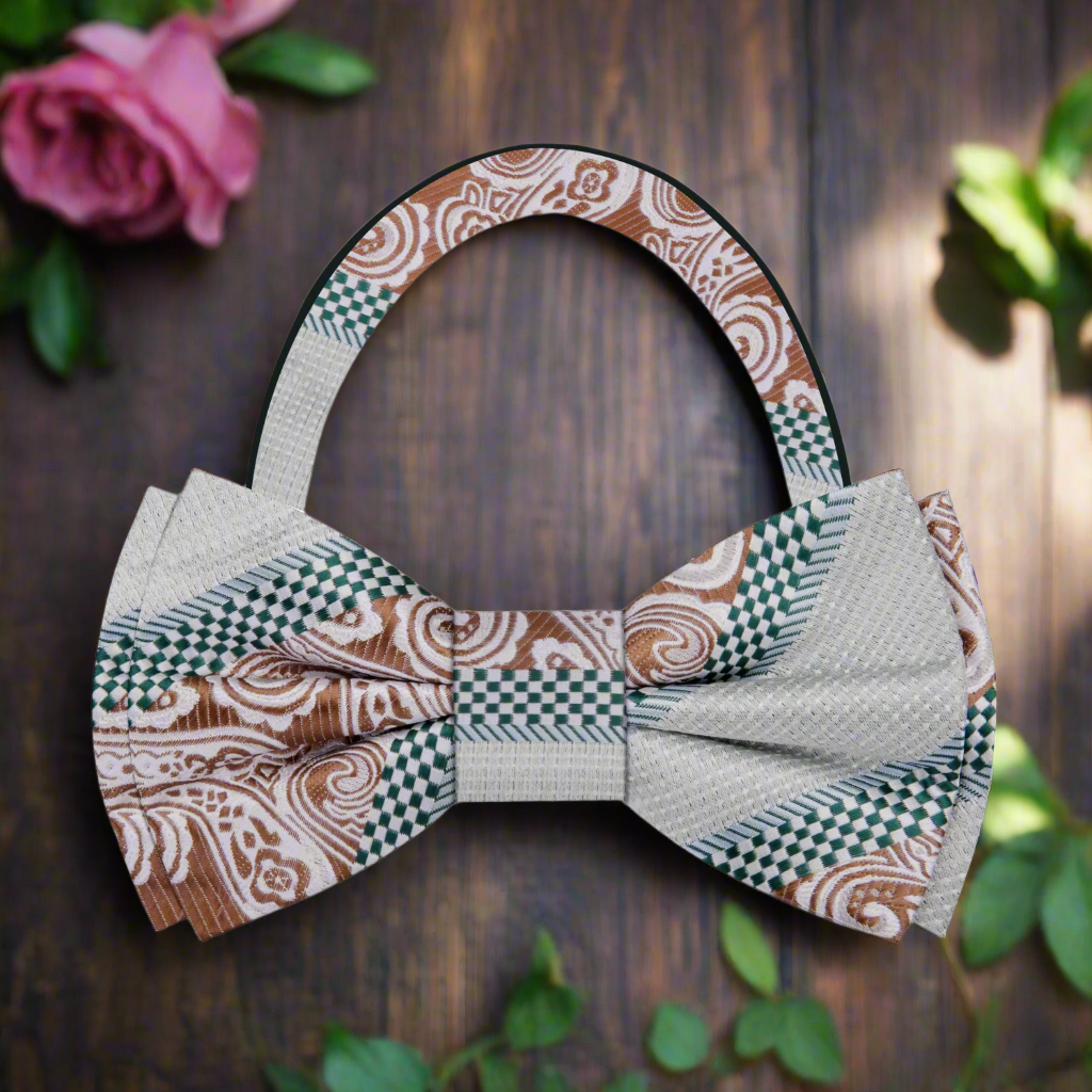 Close-up of Bergamo geometric check and paisley bow tie in dark blue and red, ideal for weddings
