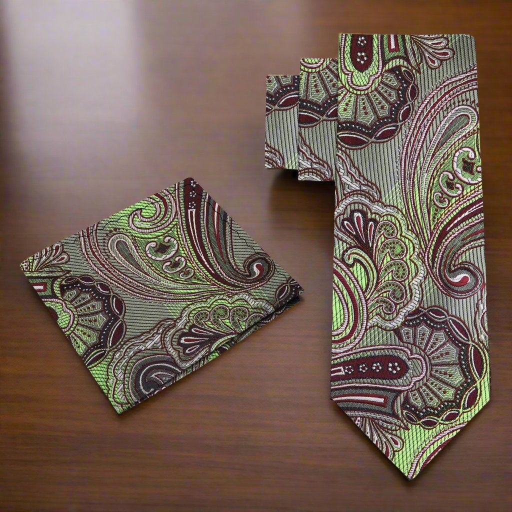 Burgundy paisley silk necktie paired with a matching pocket square, accentuating formal attire.