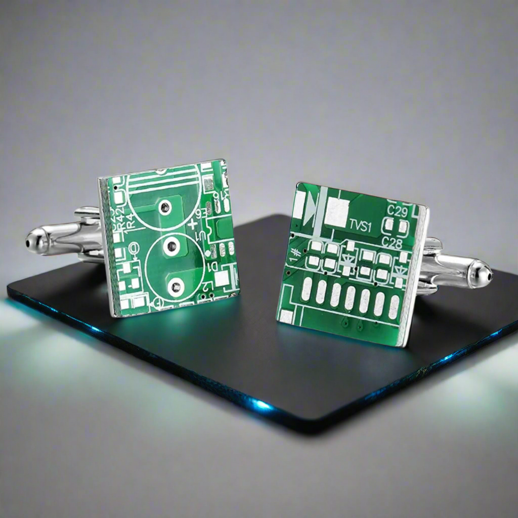 Cufflinks displayed on a white dress shirt, highlighting their tech-inspired design.
