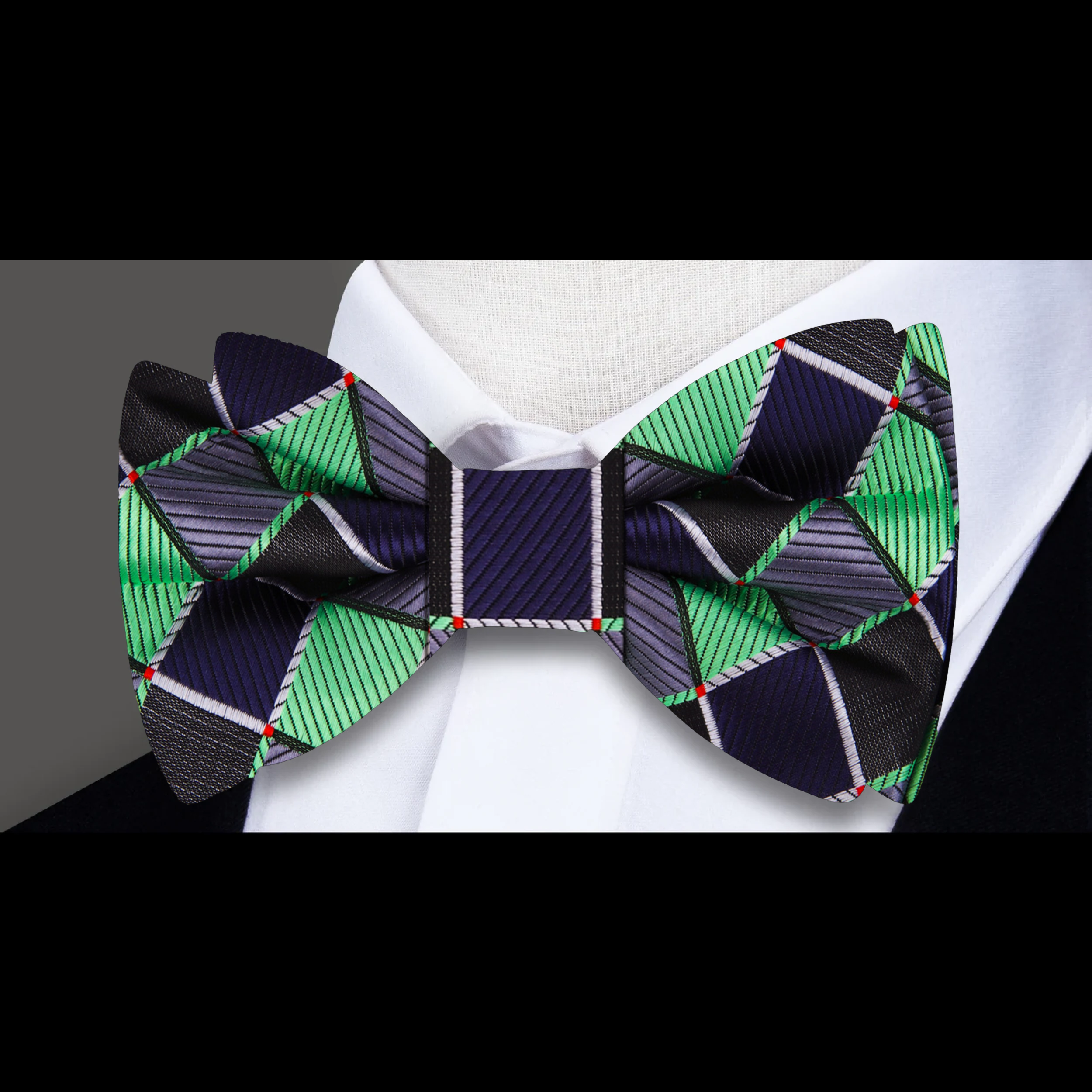 Close-up of a premium geometric bow tie showcasing intricate pattern and silk fabric