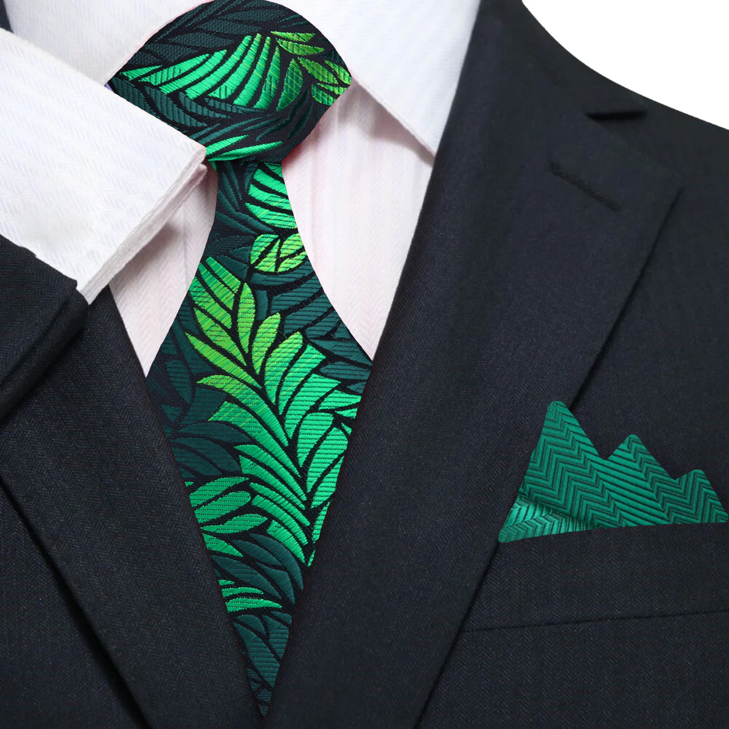 Close-up of the abstract feather design on a mens green silk necktie