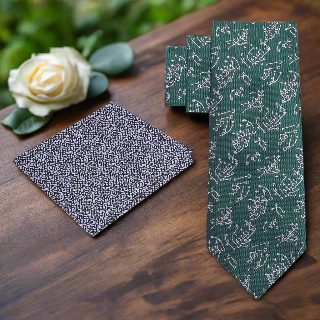 Close-up of mens football pattern necktie in green and grey for stylish office wear