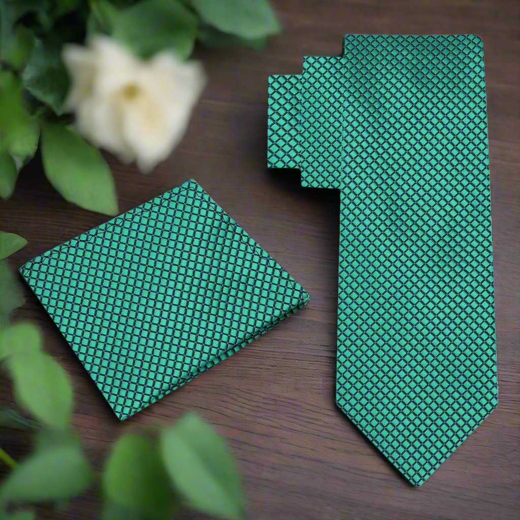 Close-up of metallic geometric silk necktie showcasing intricate pattern and sheen