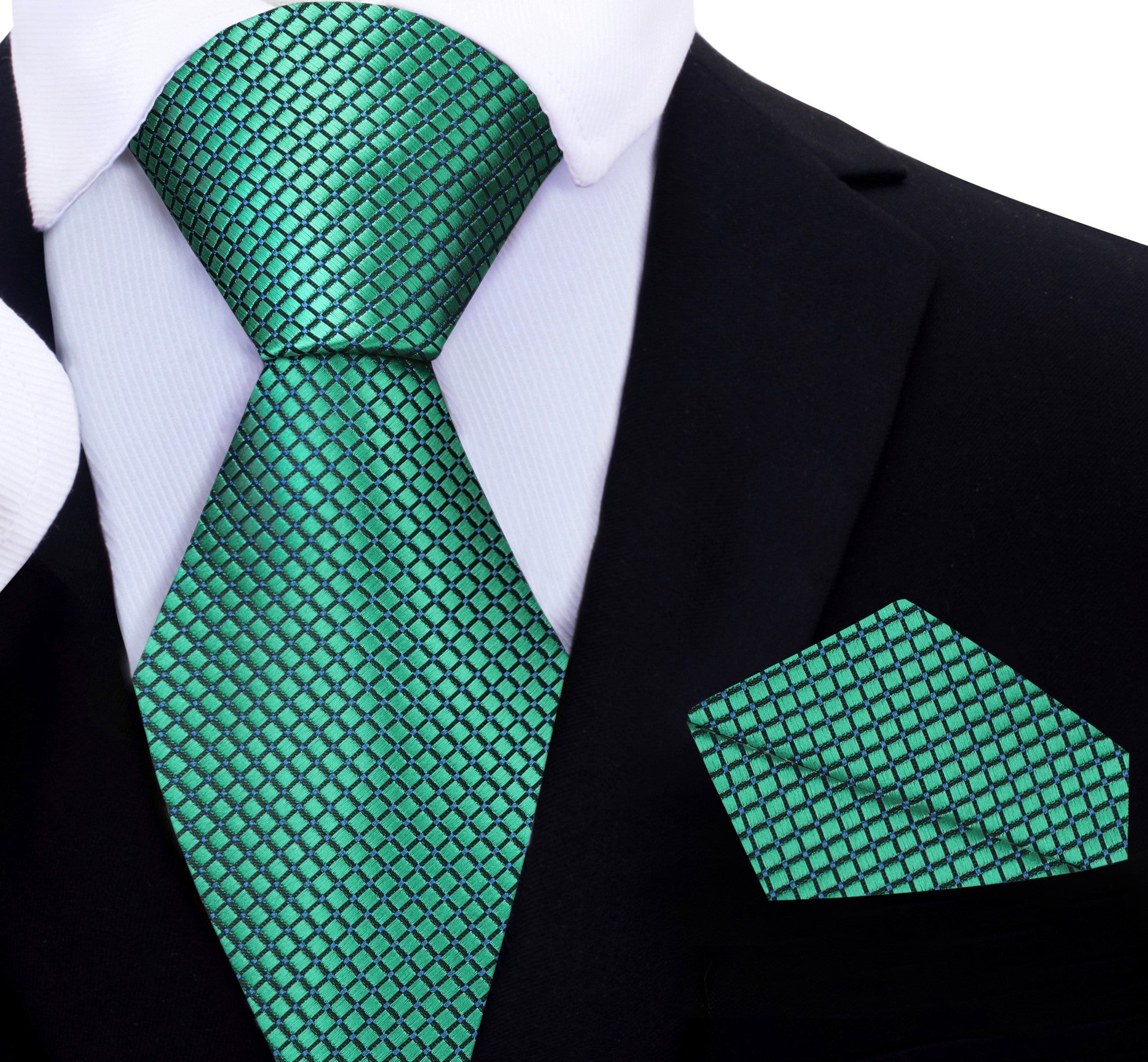 Elegant green geometric silk tie displayed on a white dress shirt, perfect for formal occasions.