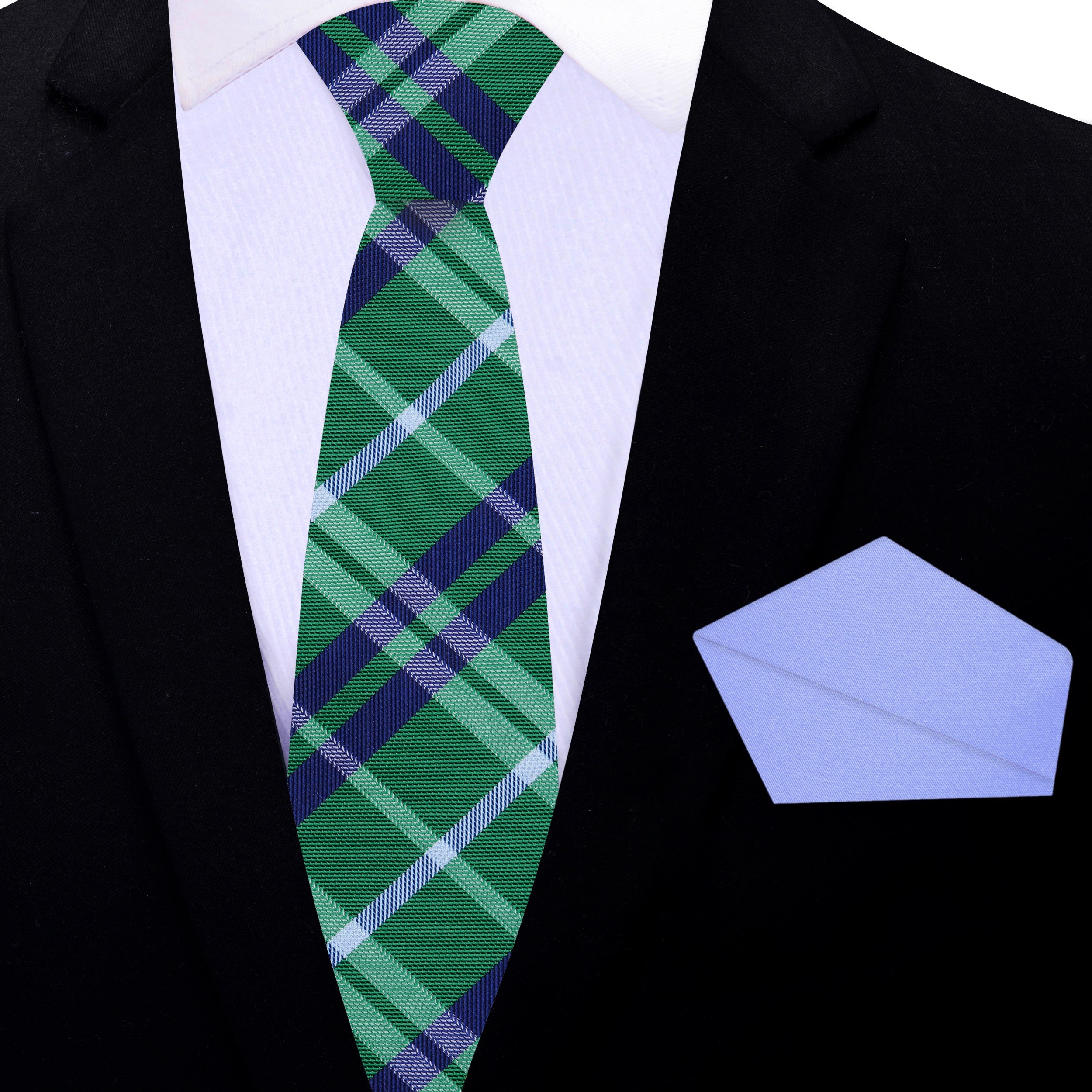 Detail shot of green and blue plaid pattern on silk necktie for formal wear