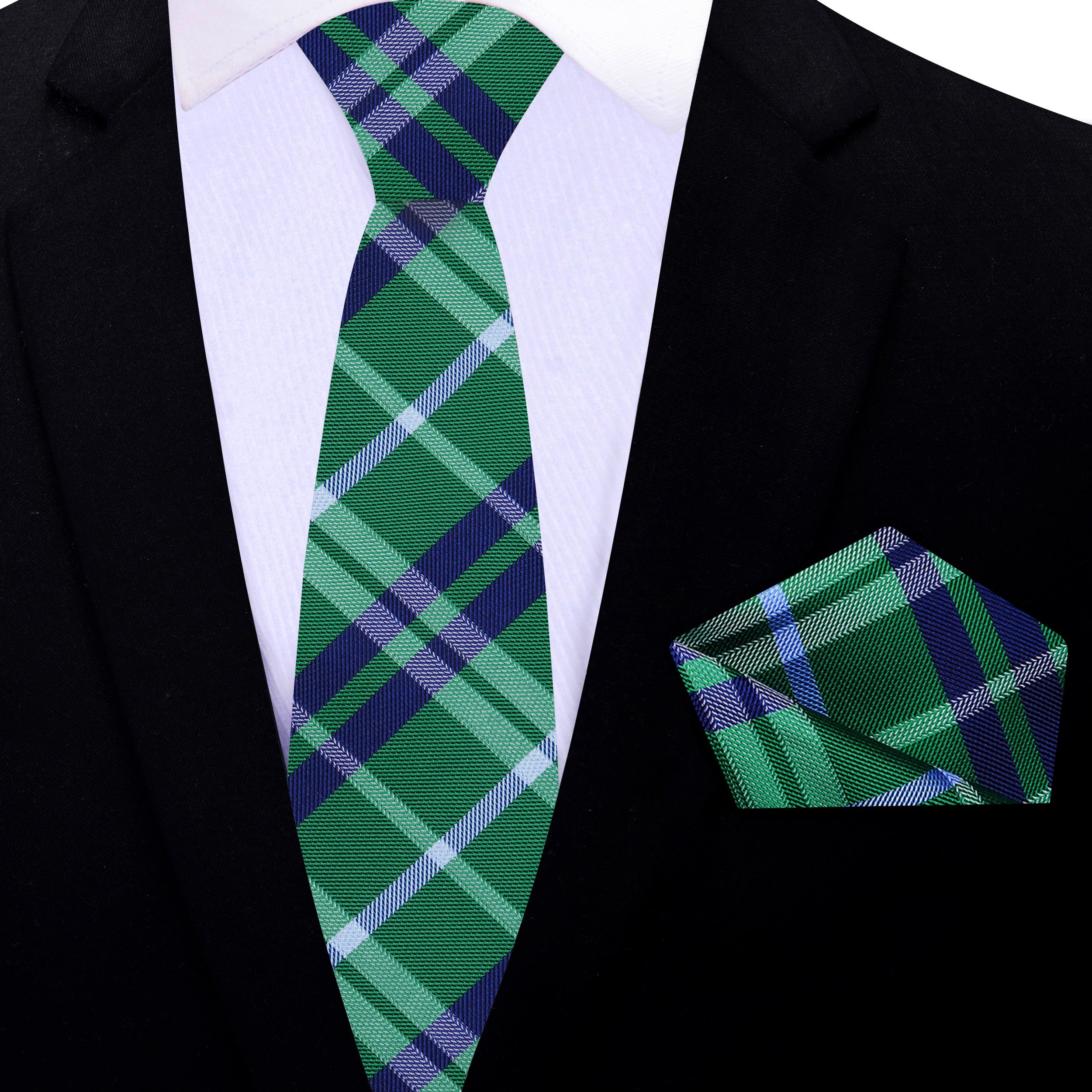 Detail shot of green and blue plaid pattern on silk necktie for formal wear