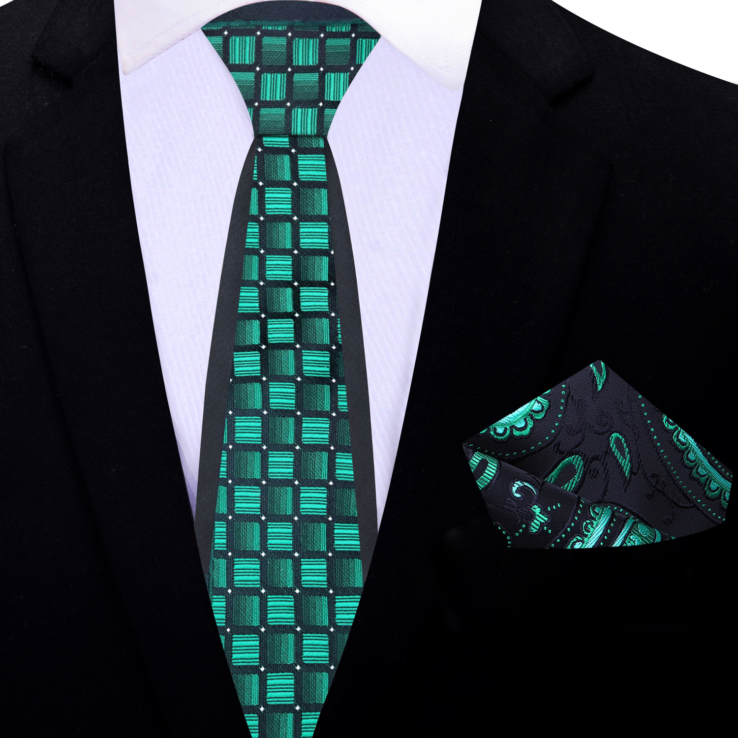 Model wearing the green and black geometric tie with a white dress shirt, highlighting its modern style.