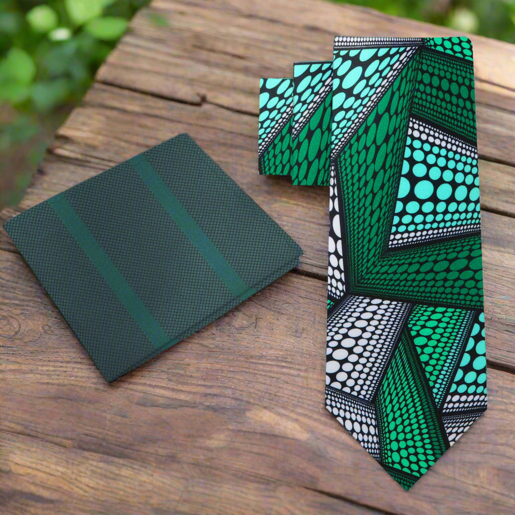 Cultural Elegance Kente necktie displayed on a wooden surface, showcasing its geometric pattern.