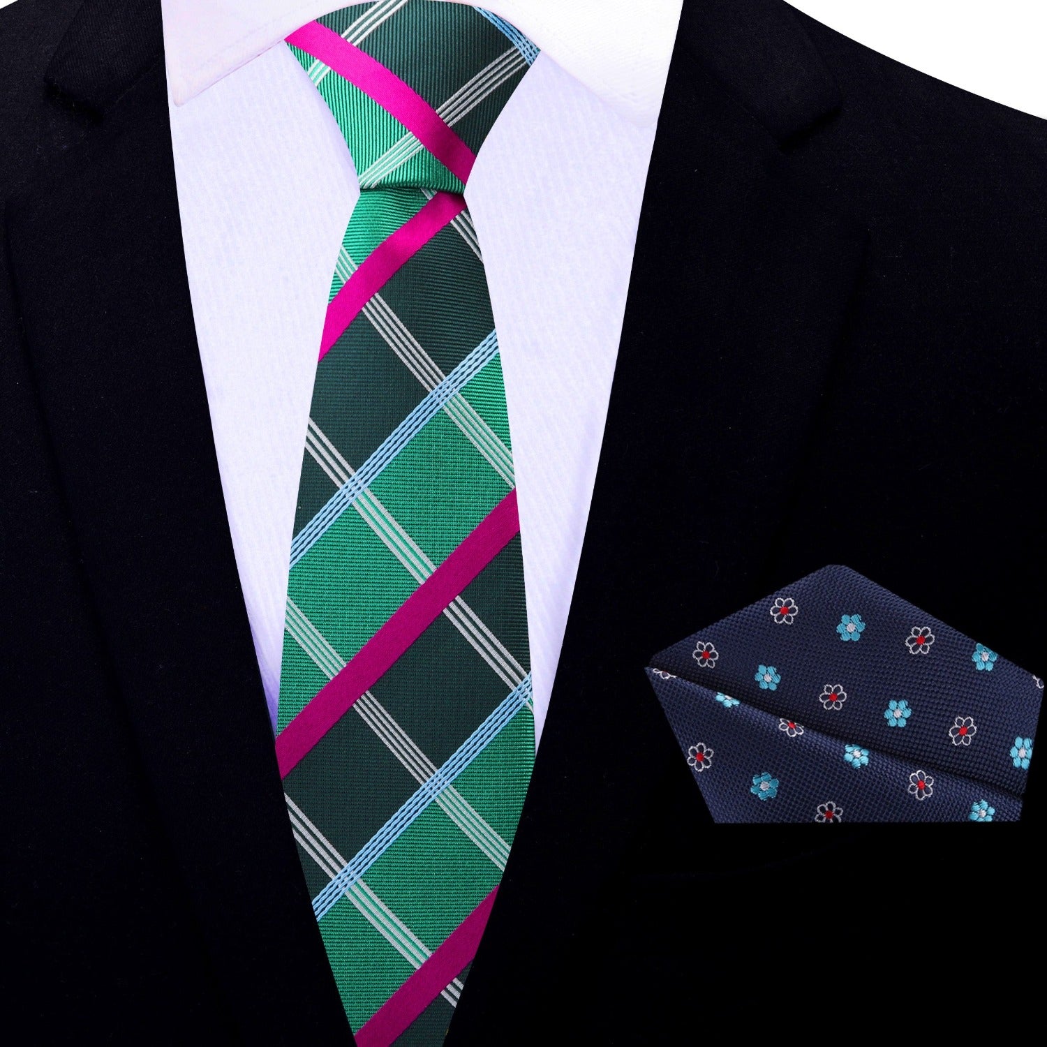 Model wearing a stylish plaid silk necktie paired with a navy suit