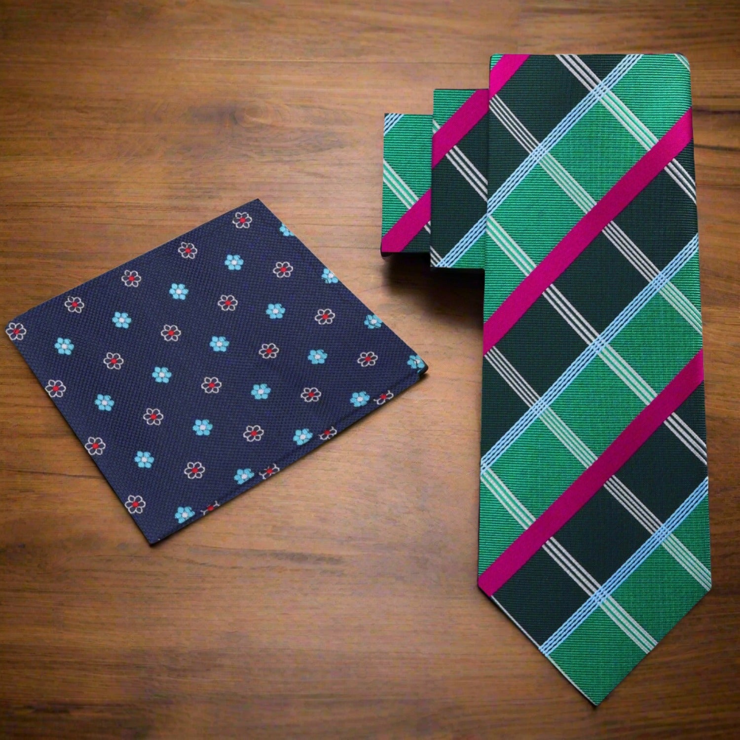 Flat lay of vibrant plaid necktie with matching pocket square