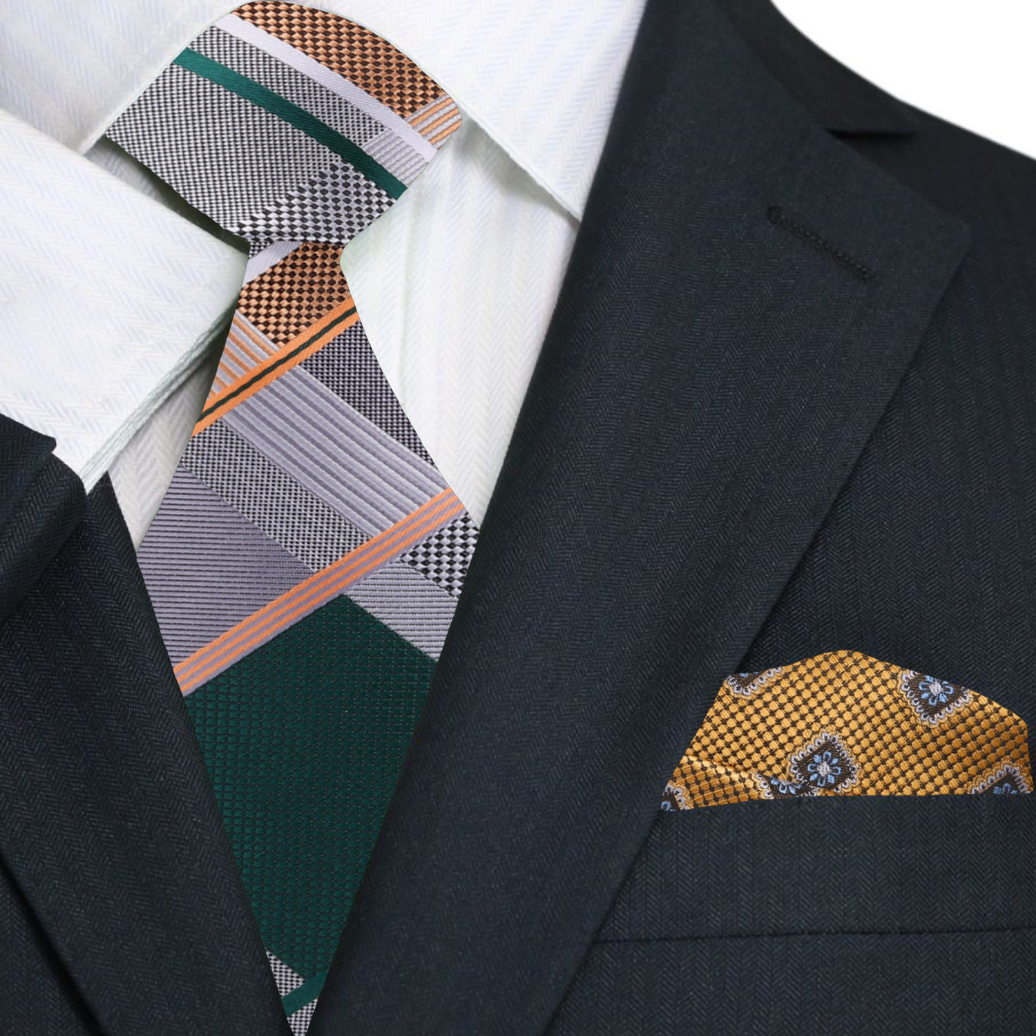 Close-up of the grey plaid tie draped over a white dress shirt, highlighting the ties intricate design and color combinations.