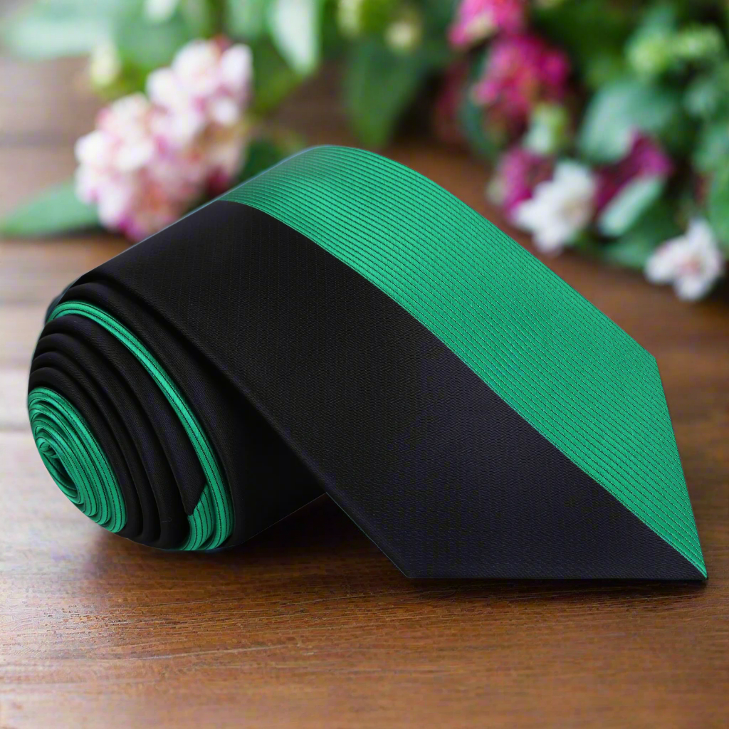 Close-up of black green silk necktie showcasing the two-tone stripe design