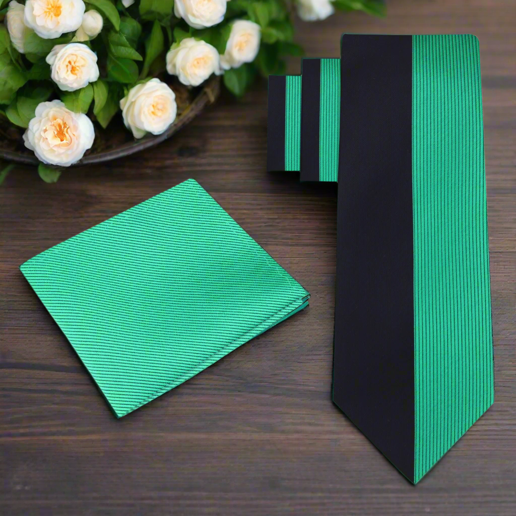 Close-up of black green silk necktie showcasing the two-tone stripe design