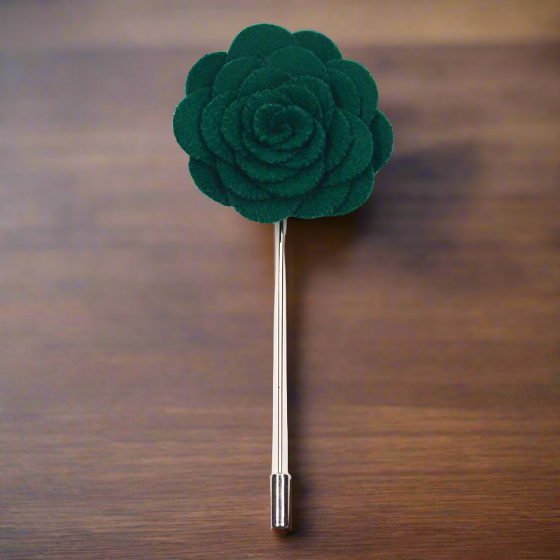 Close-up of vibrant petal lapel pin on a suit jacket