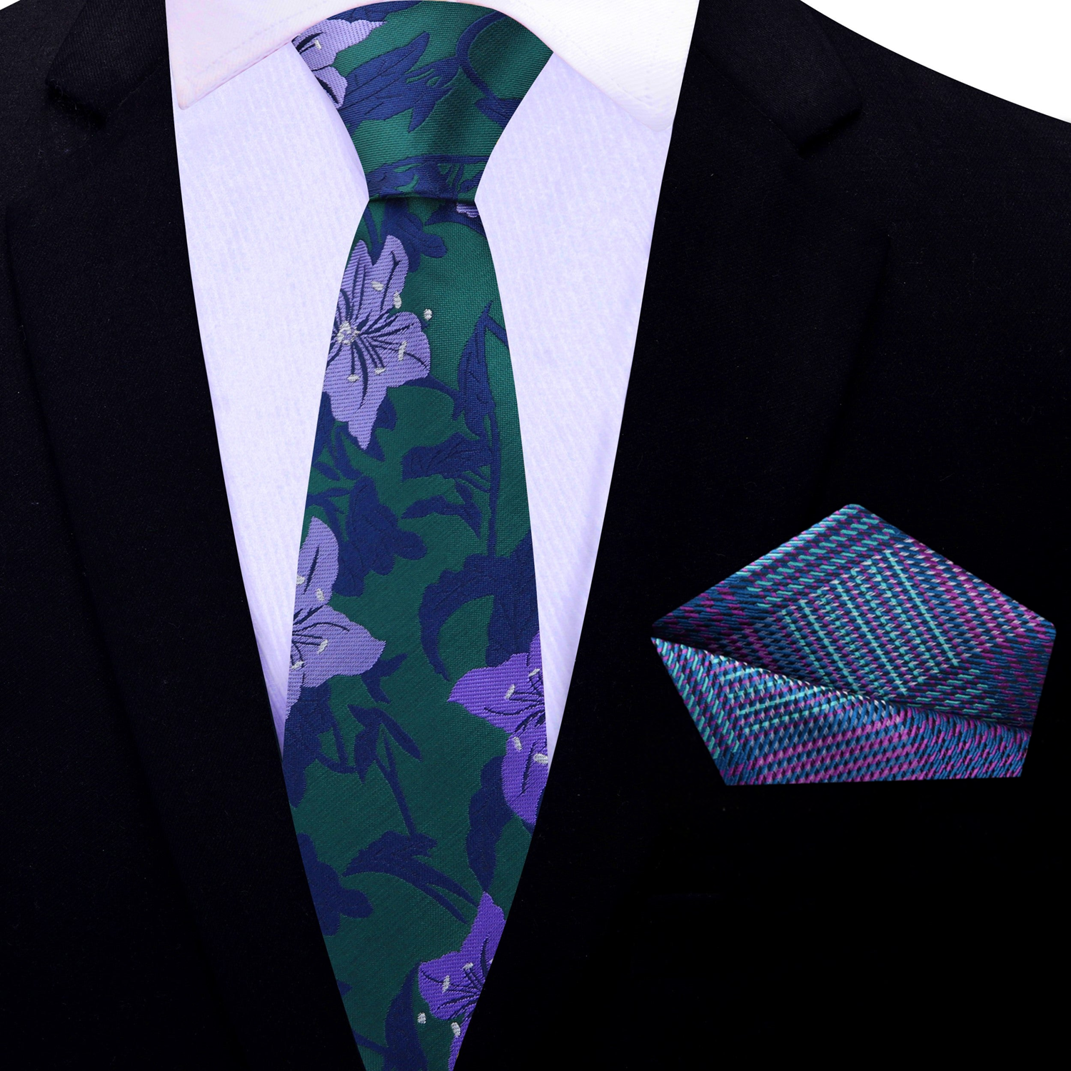 Elegant floral tie paired with a white dress shirt, showcasing its striking design.