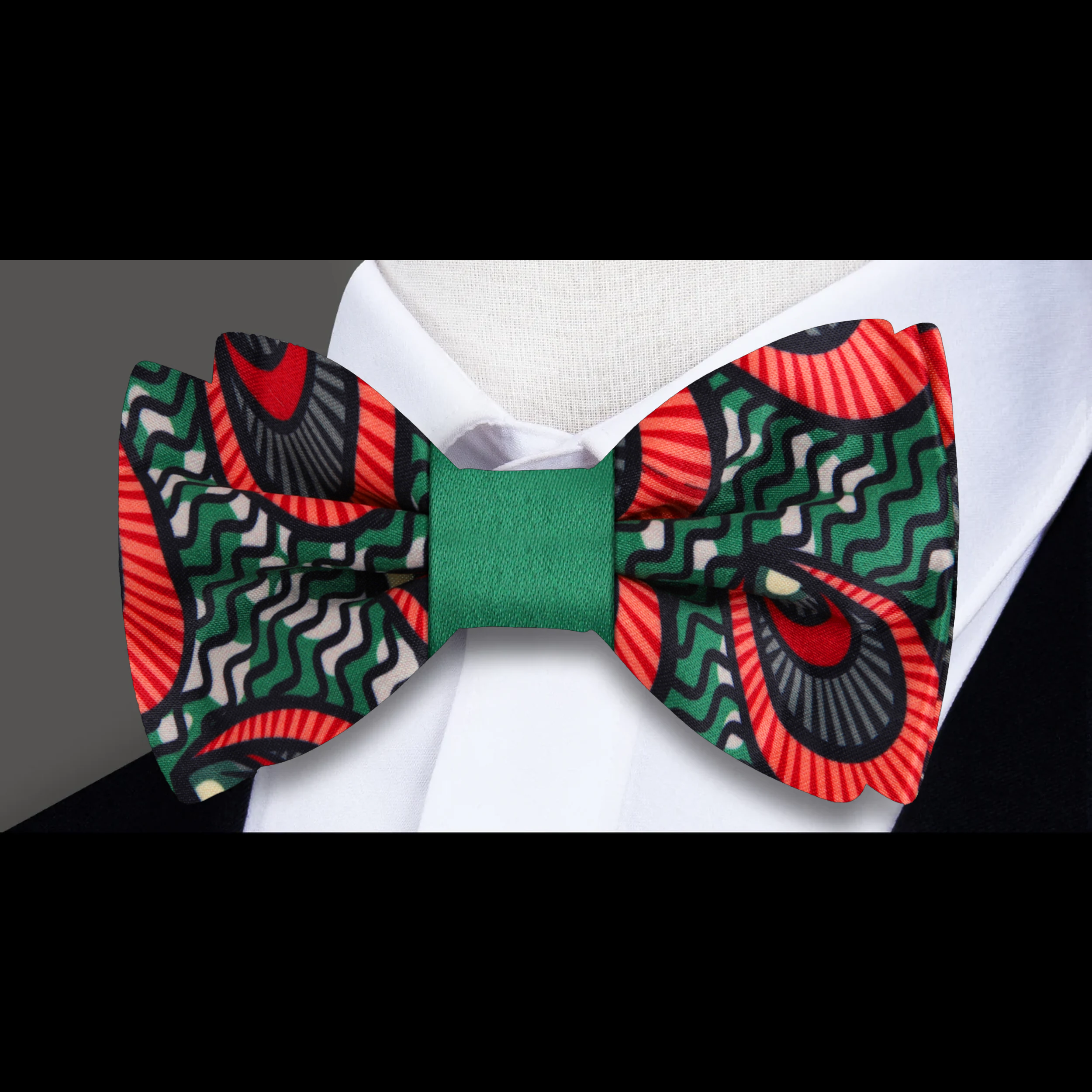 Self tie silk bow tie displayed with a matching pocket square, ideal for weddings.