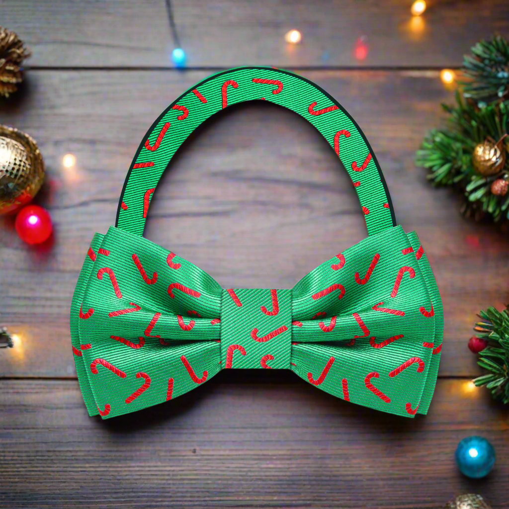 Close-up of the candy cane bow tie showing silk texture and festive red-green pattern