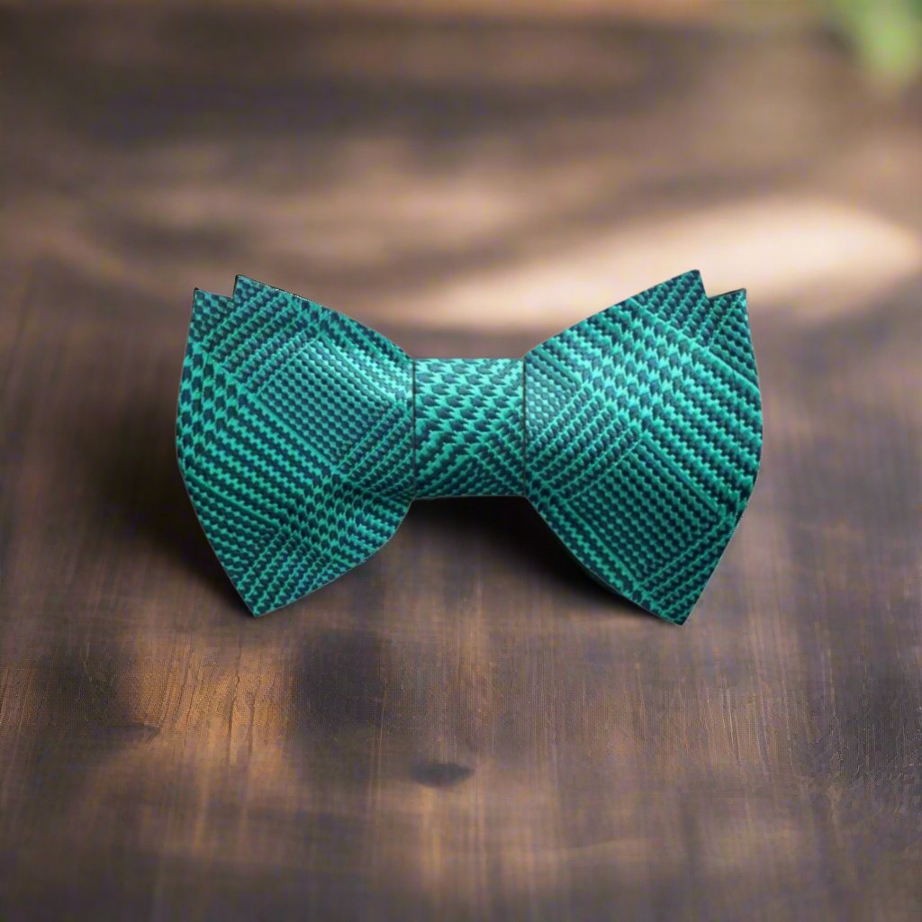 Close-up of a green plaid silk bow tie on a dress shirt, perfect for weddings