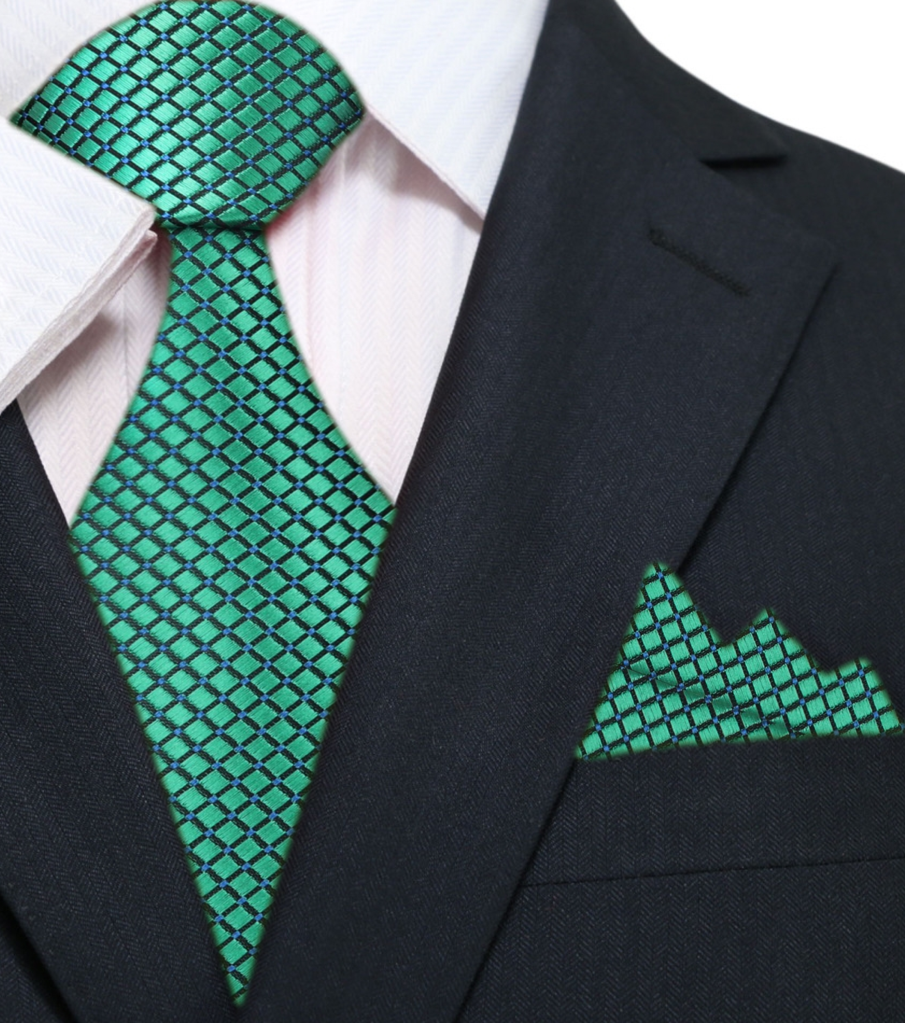 Silk tie with geometric pattern and metallic finish draped over a suit