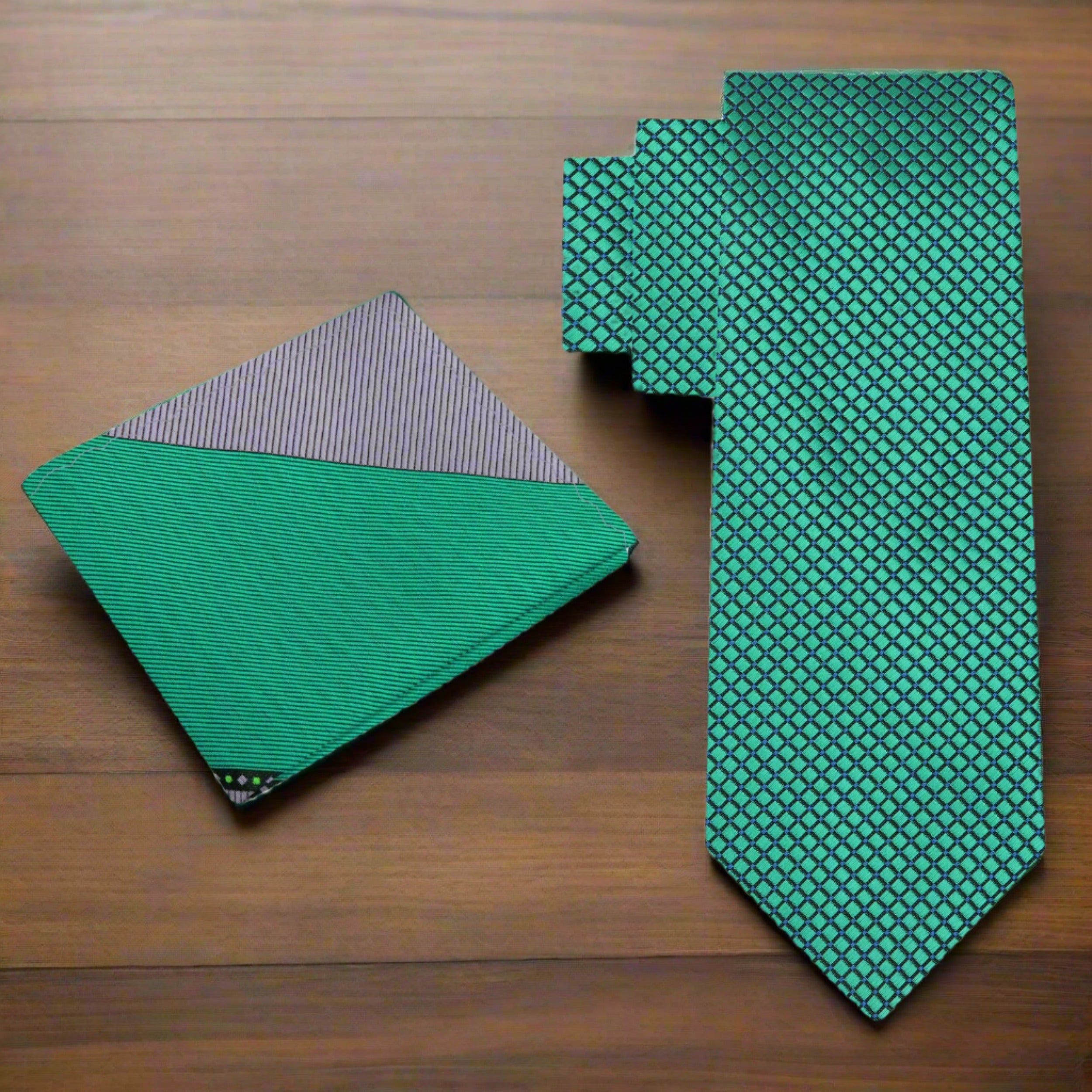 Close-up of the geometric pattern on the green silk tie, showcasing its intricate design.