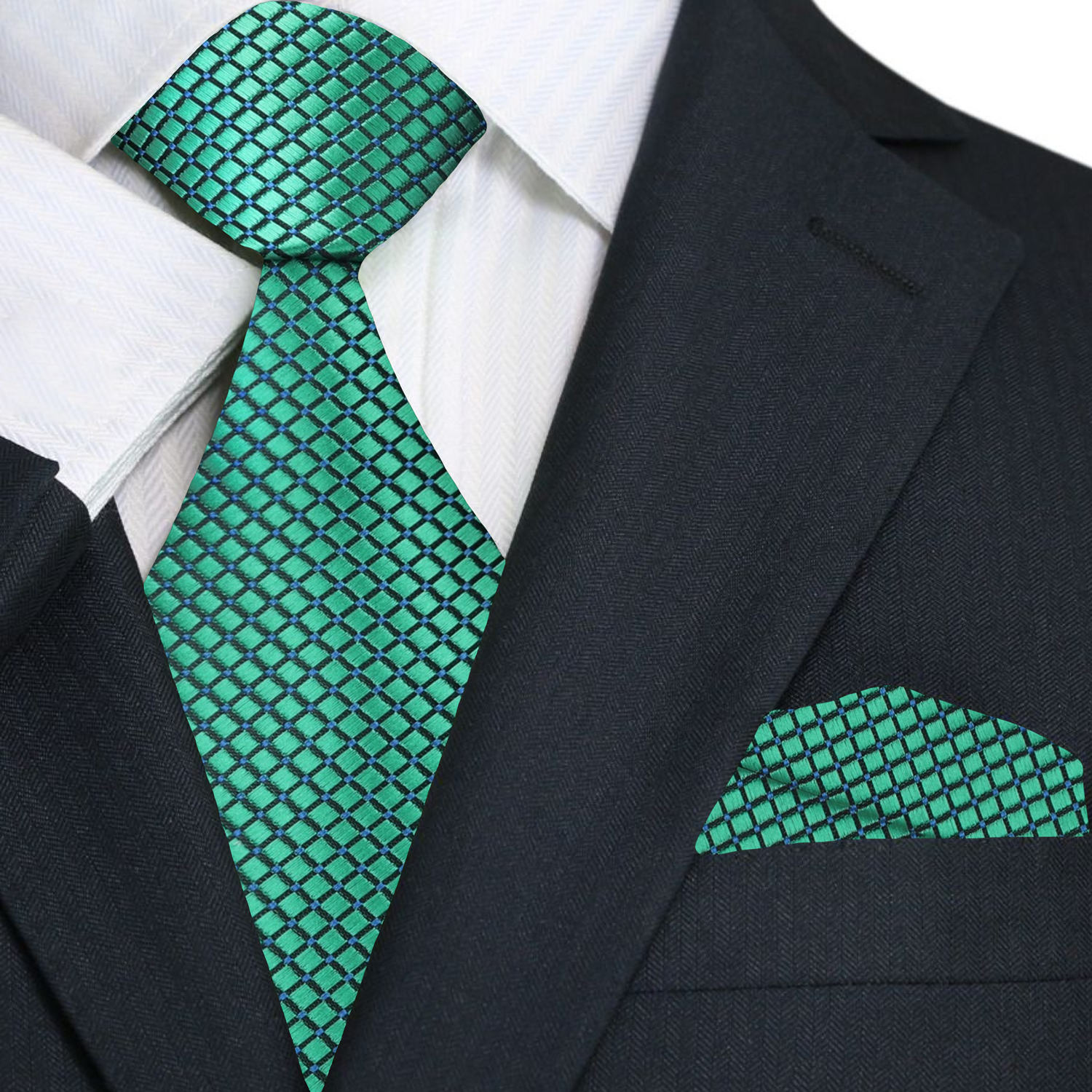 Green geometric silk tie styled with a navy suit, ideal for weddings or business meetings.