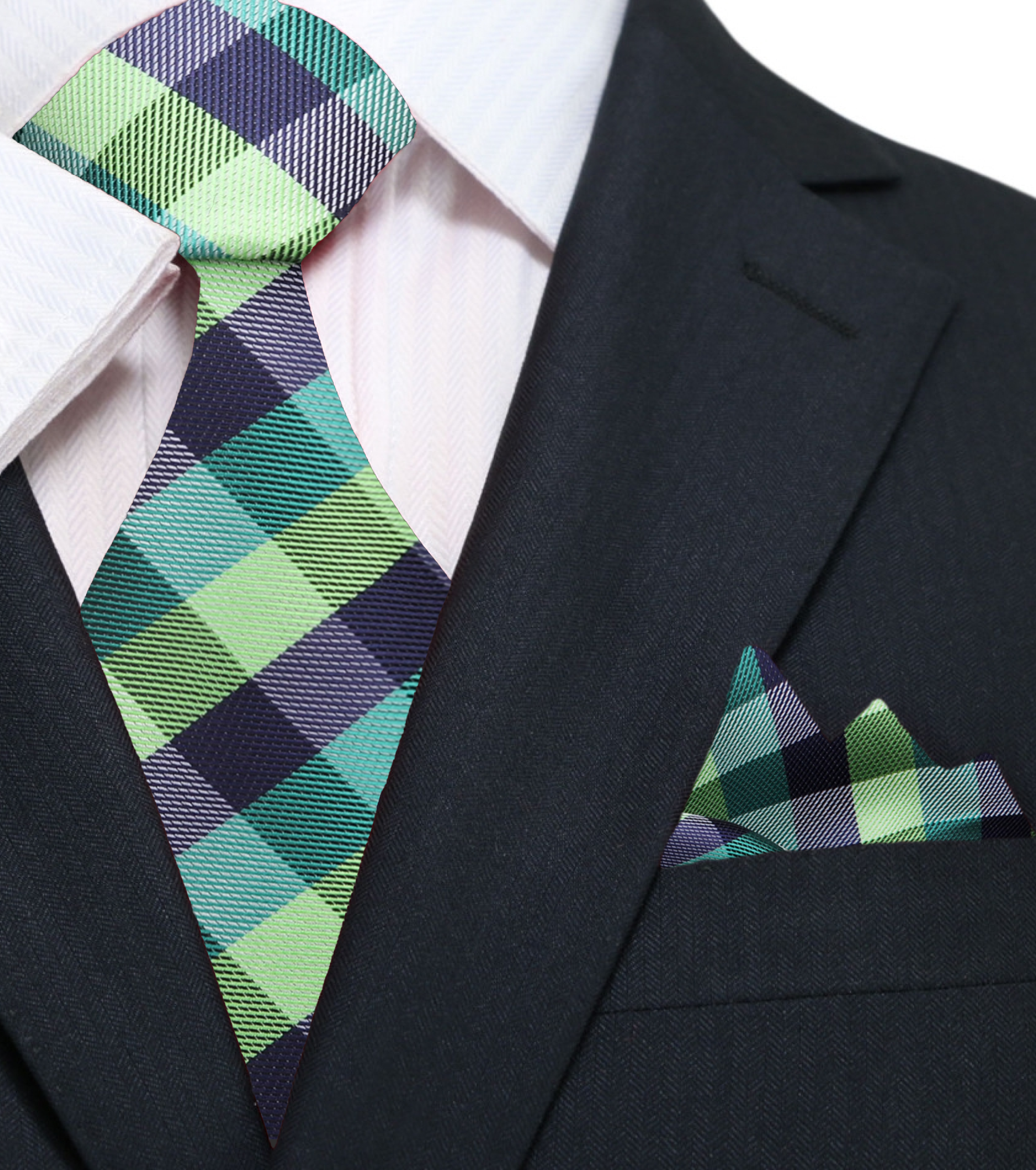 Man wearing a stylish green necktie with a navy suit at a wedding