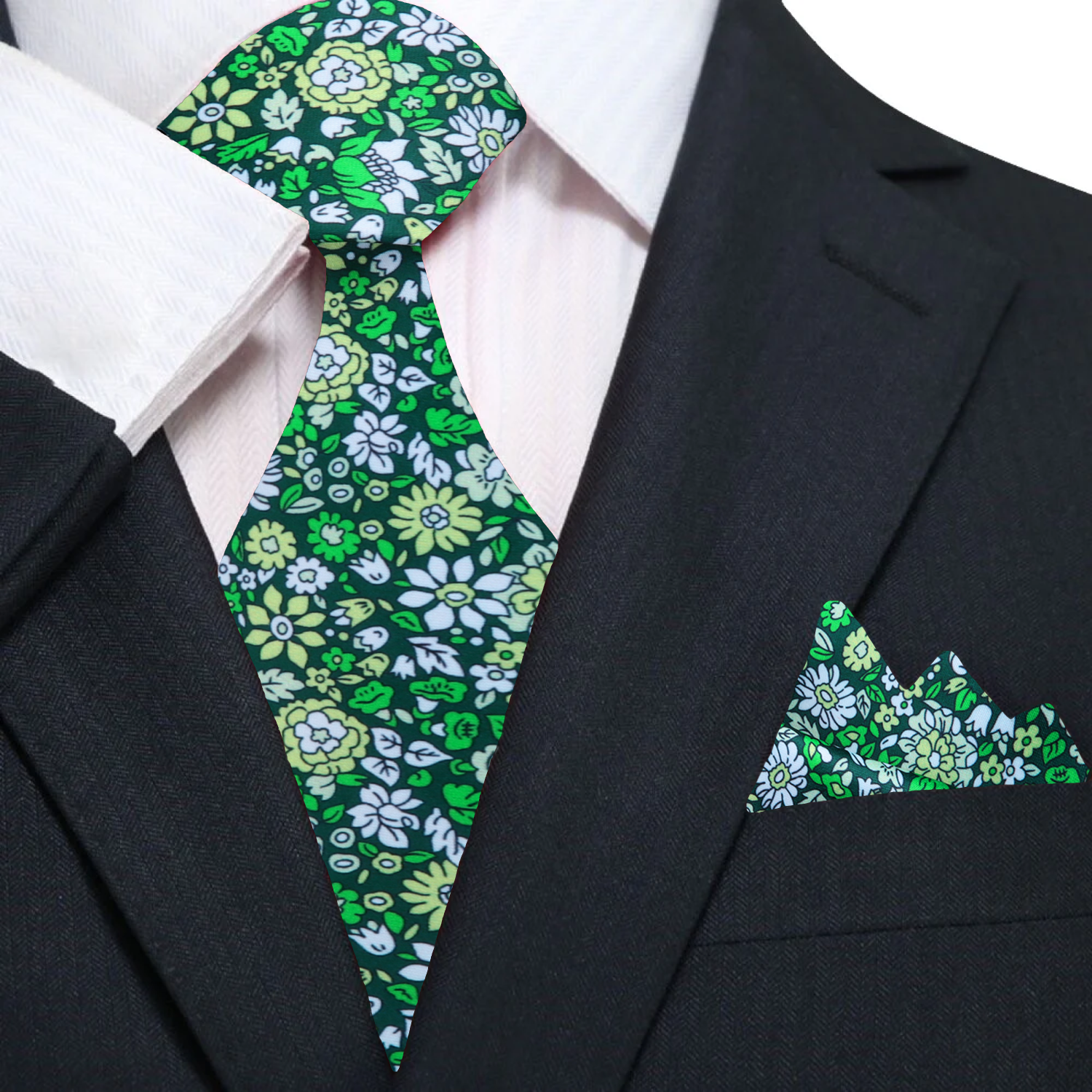 Model wearing a floral silk necktie with a white dress shirt and navy suit