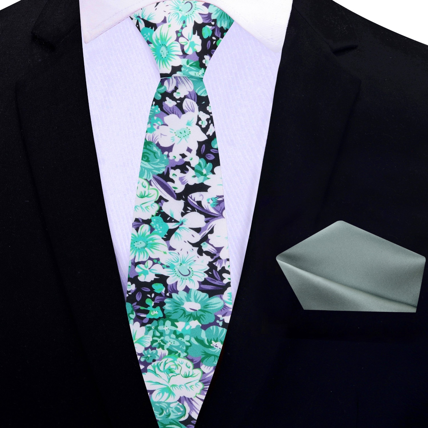 Stylish mens floral necktie paired with a matching pocket square for formal occasions