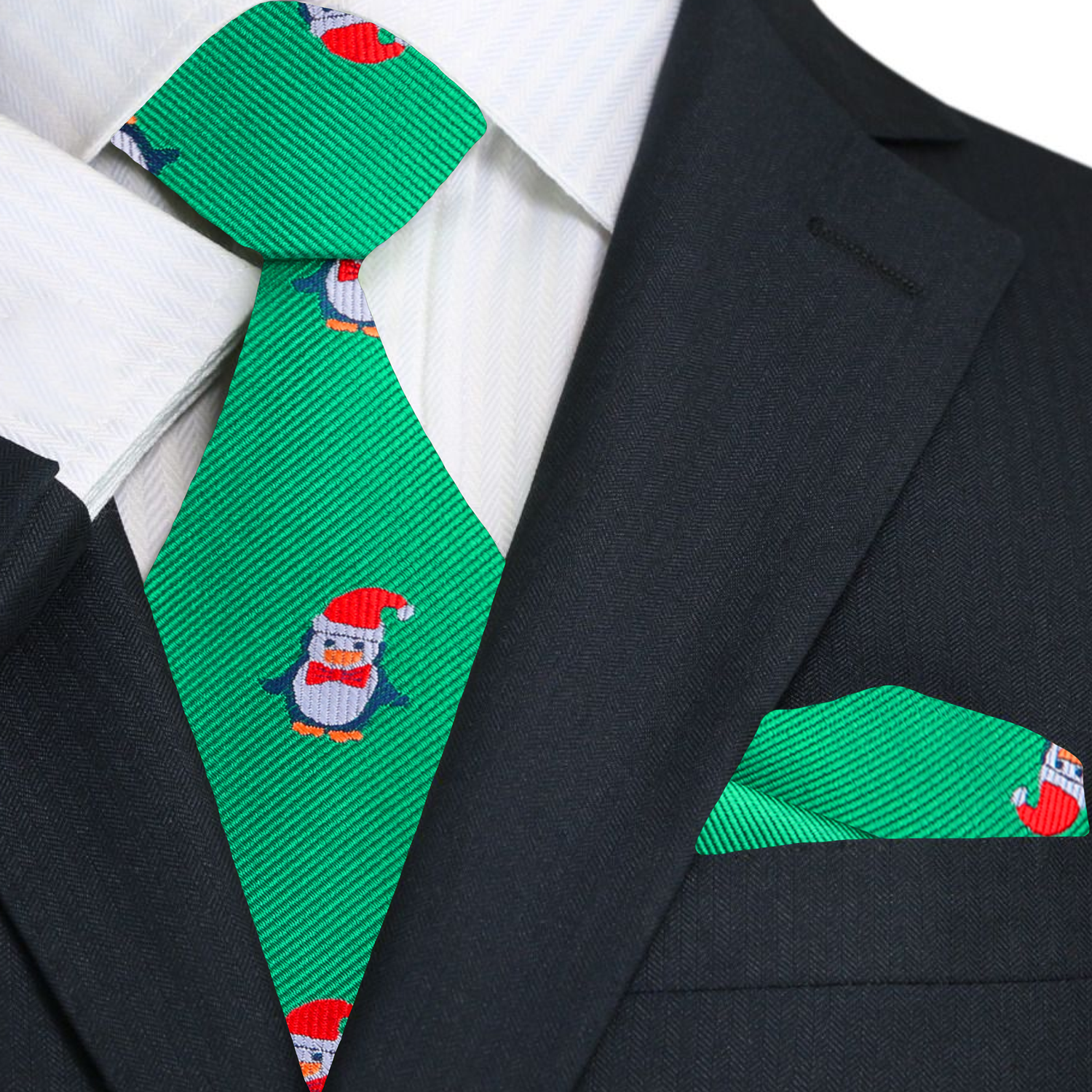 Close-up of the festive penguin silk necktie with vibrant colors and patterns.