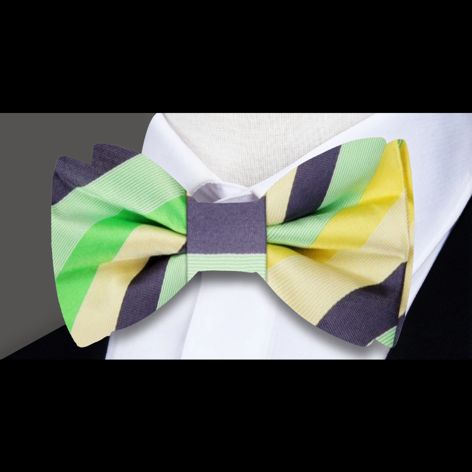 Elegant pastel striped bow tie styled on a crisp white dress shirt.