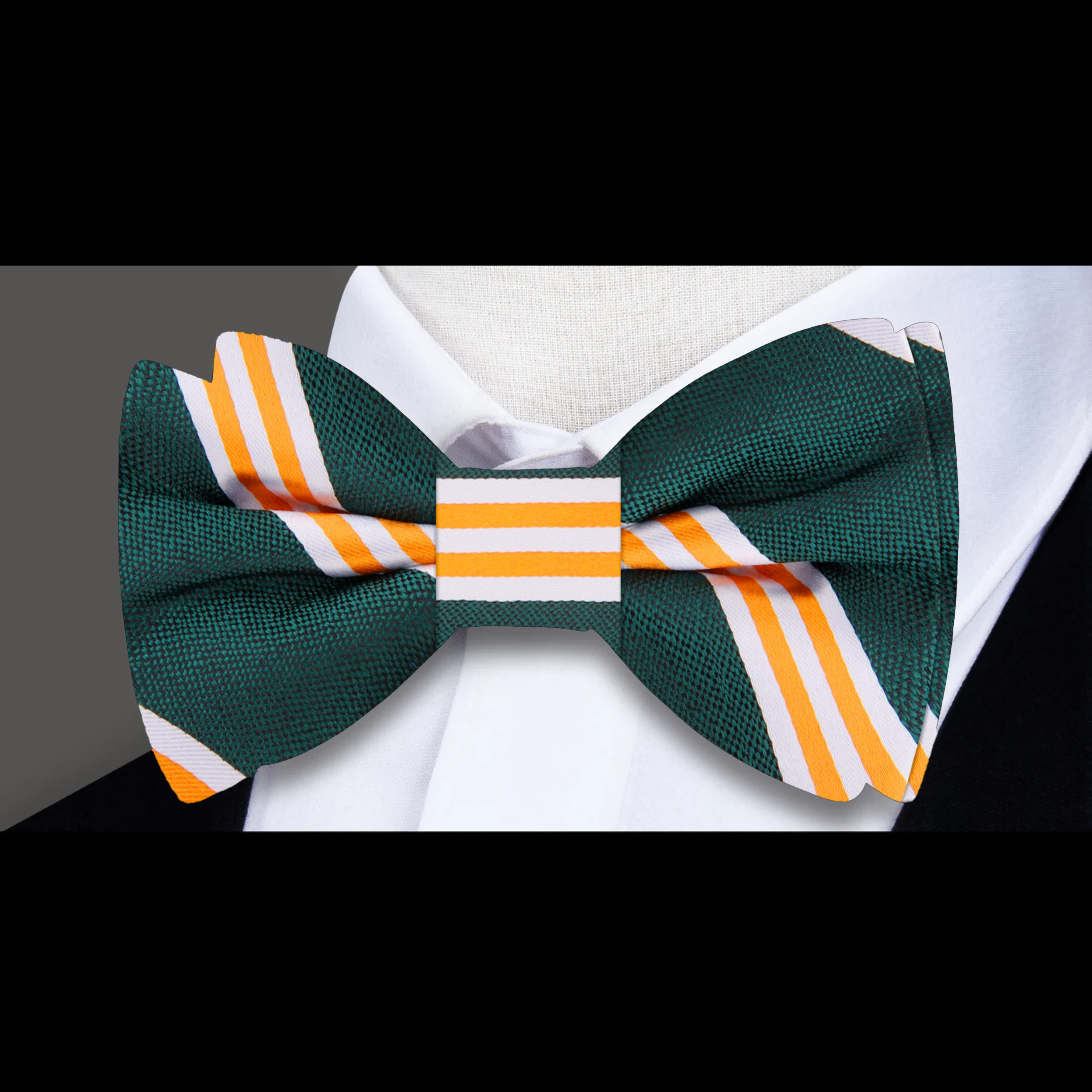 Man adjusting a pre-tied mens bow tie for wedding attire