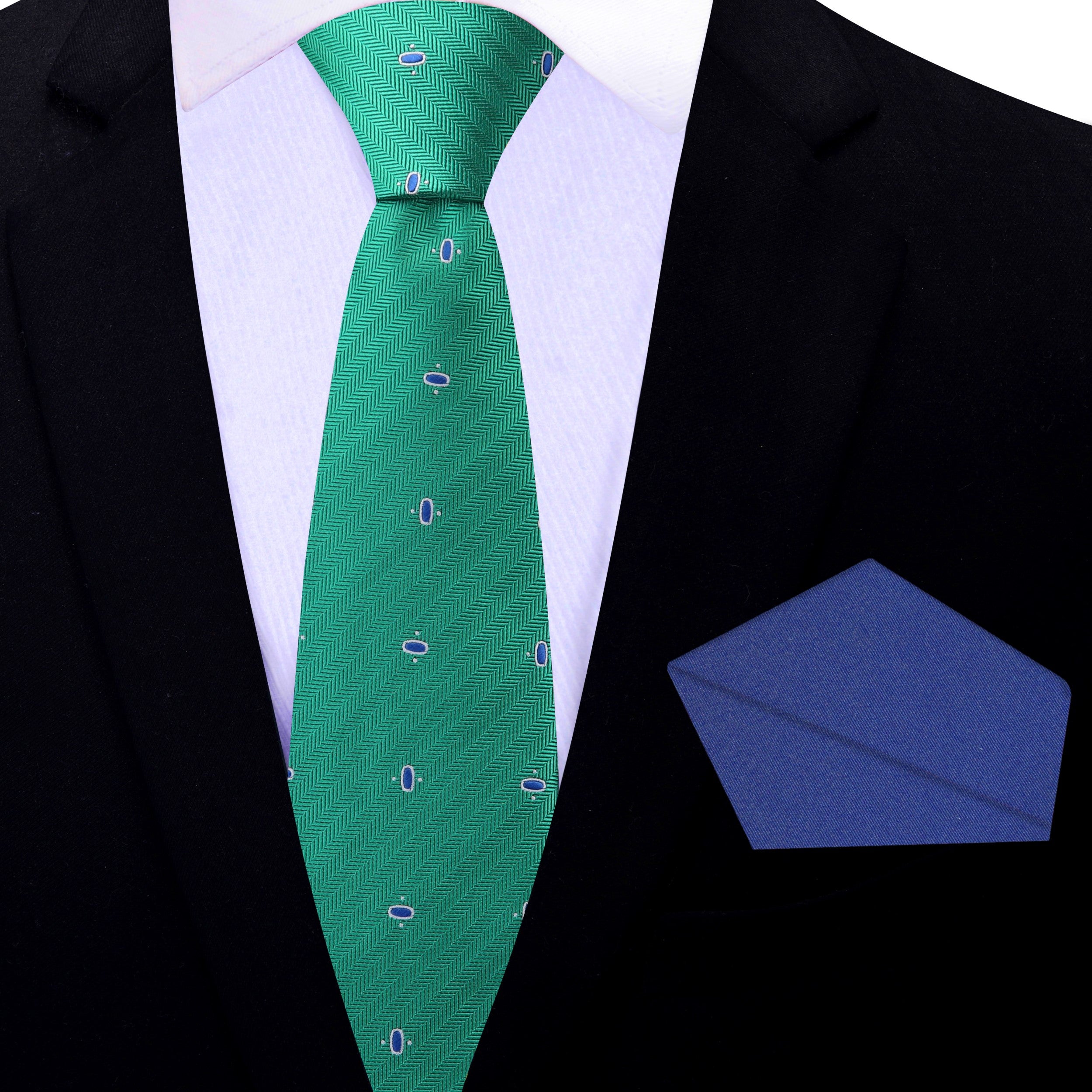 Cadence Classic Tie next to a light grey dress shirt, highlighting its versatility for various outfits.