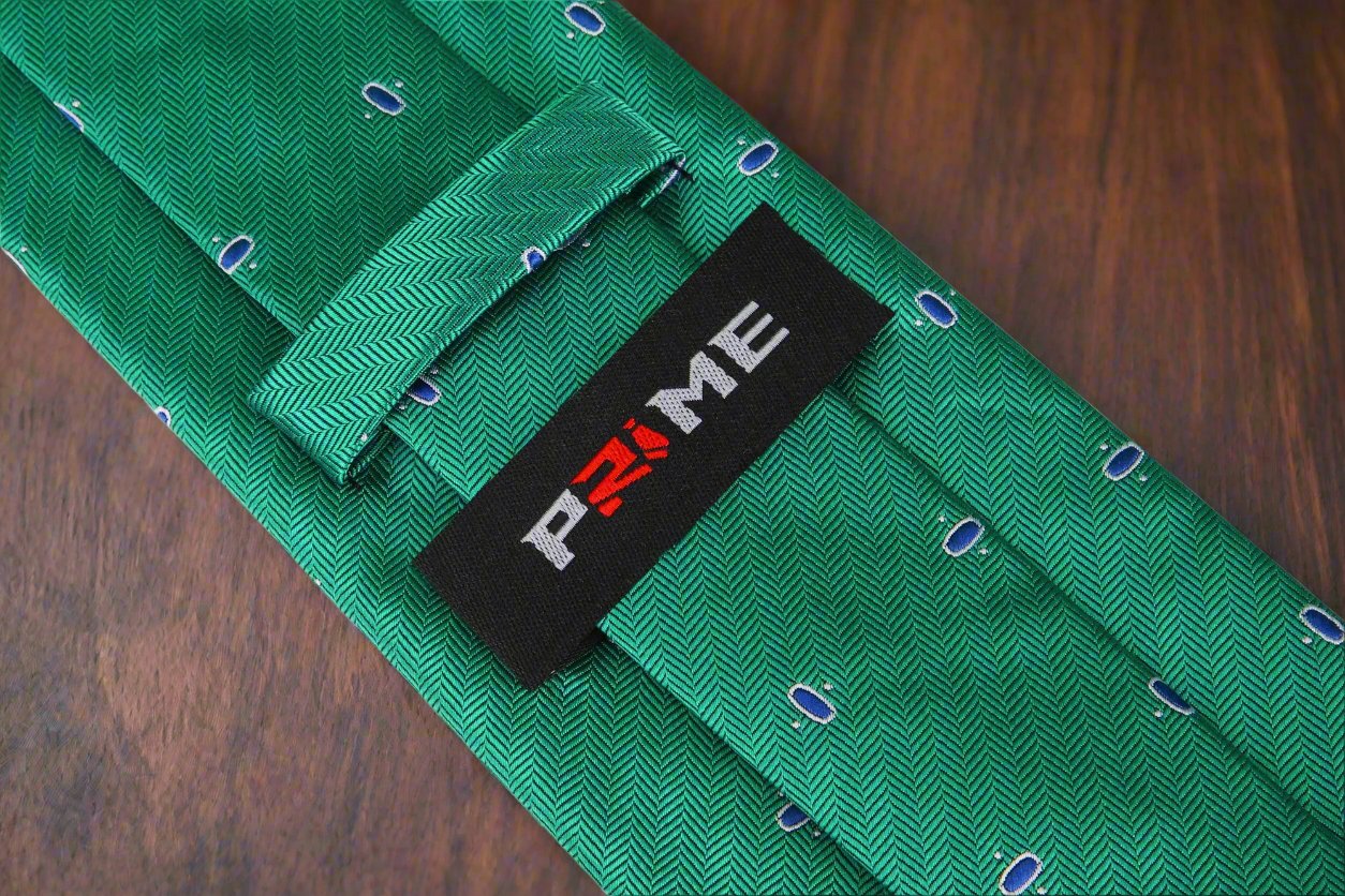 Cadence Classic Silk Tie styled with a navy suit and white dress shirt, showcasing its elegant look.