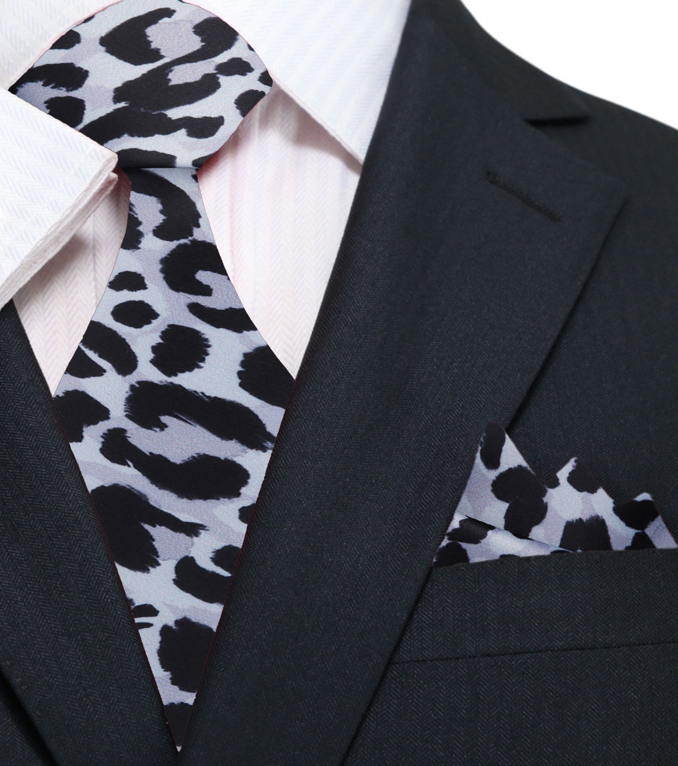 Close-up of the cheetah print necktie showcasing its vibrant pattern and silk texture.