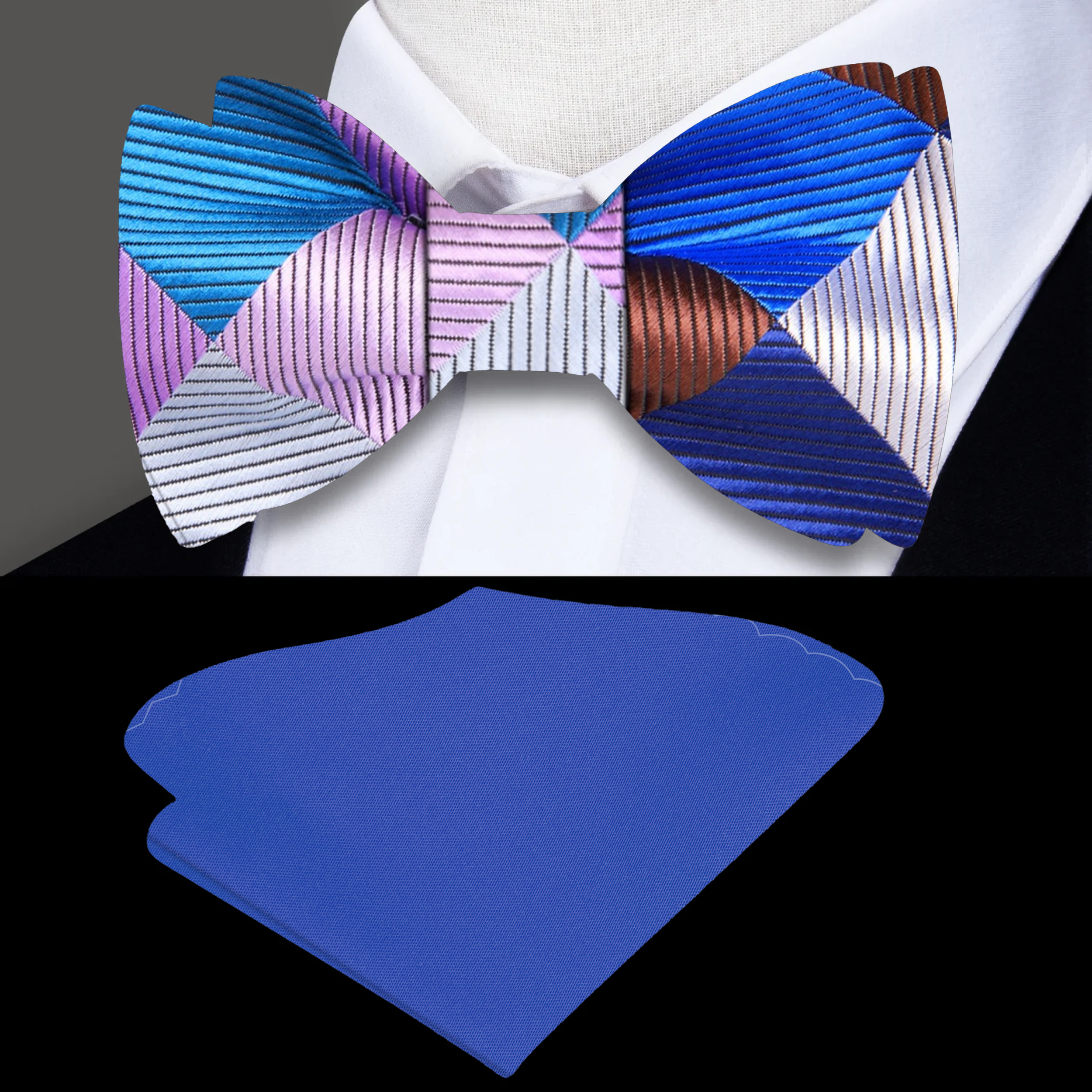 Man wearing a stylish self tie bow tie with a navy suit at a formal event