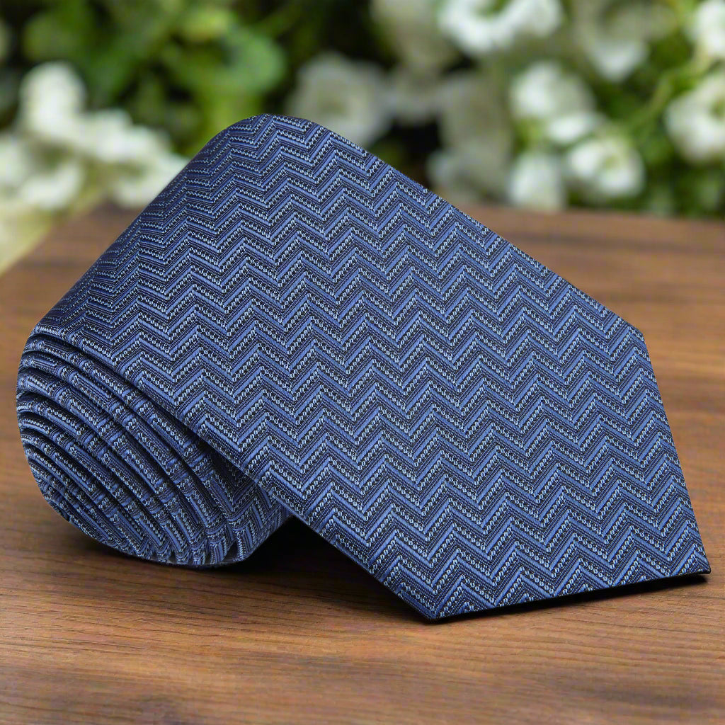 Front view of Granthollow chevron patterned men's necktie in steel blue and grey