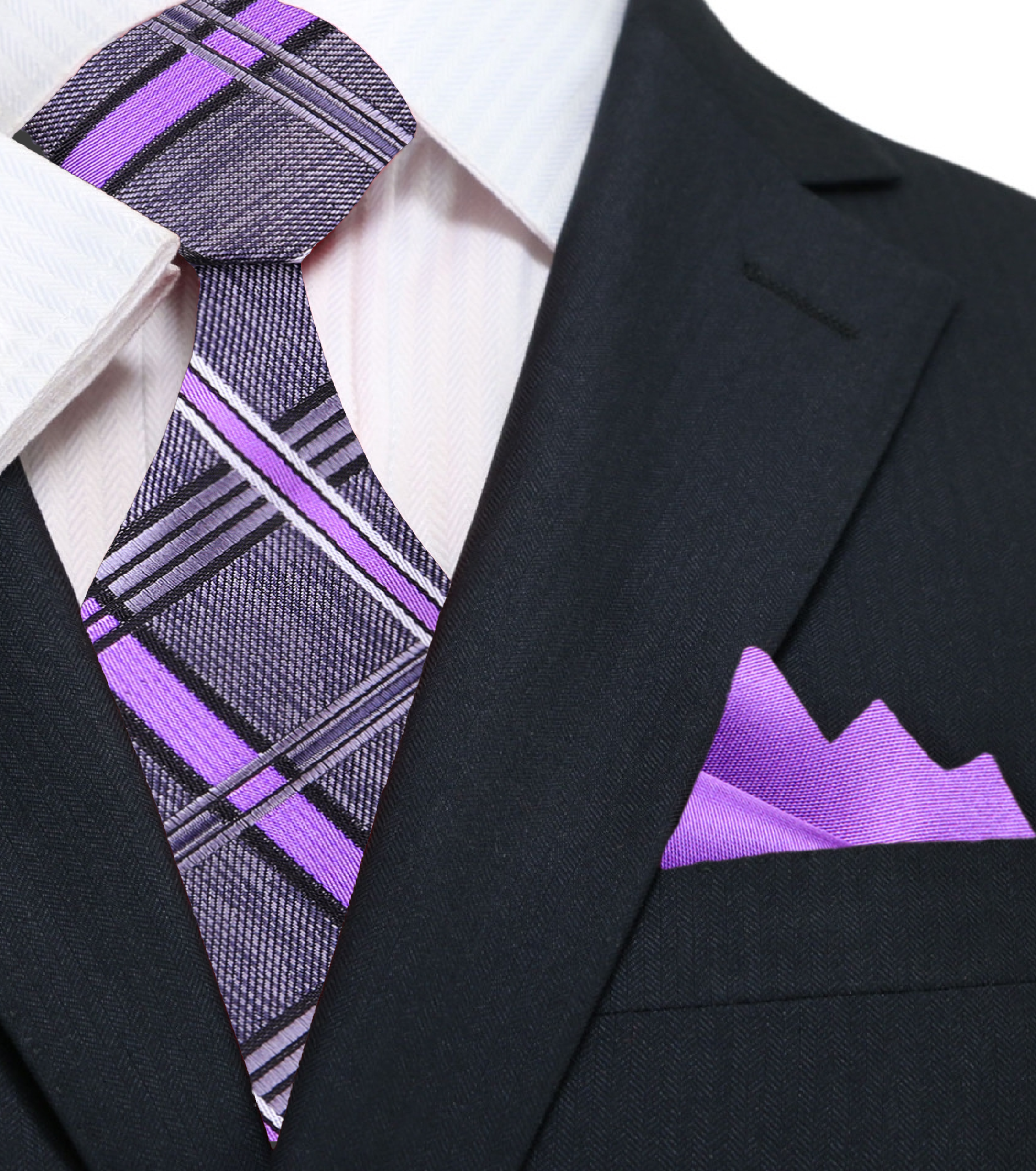 Close-up of the plaid pattern on the silk tie showing intricate details.