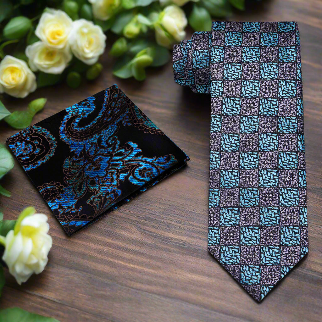 Close-up of geometric pattern on grey and light blue silk necktie