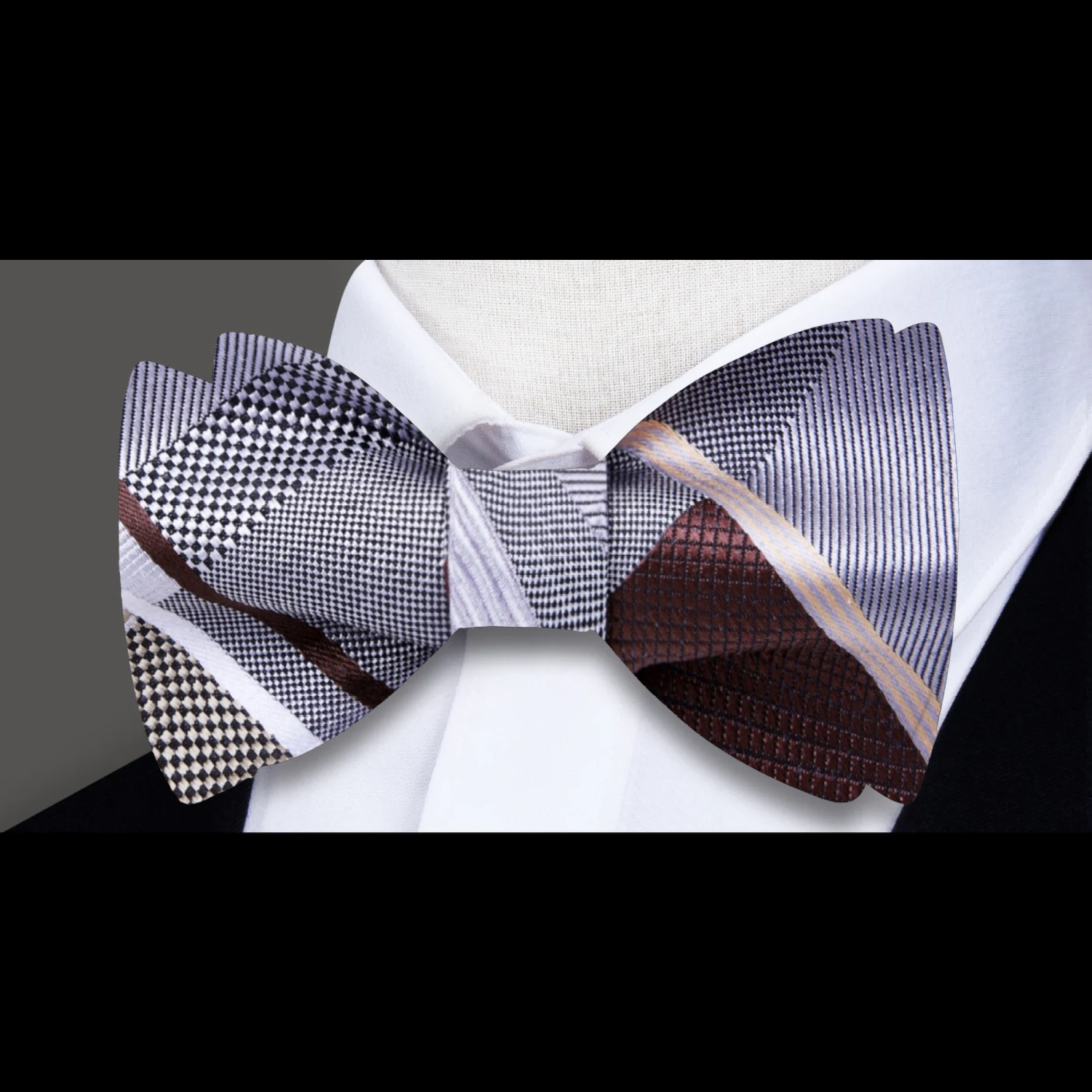 Close-up of the grey and mahogany geometric bow tie showcasing its intricate design.