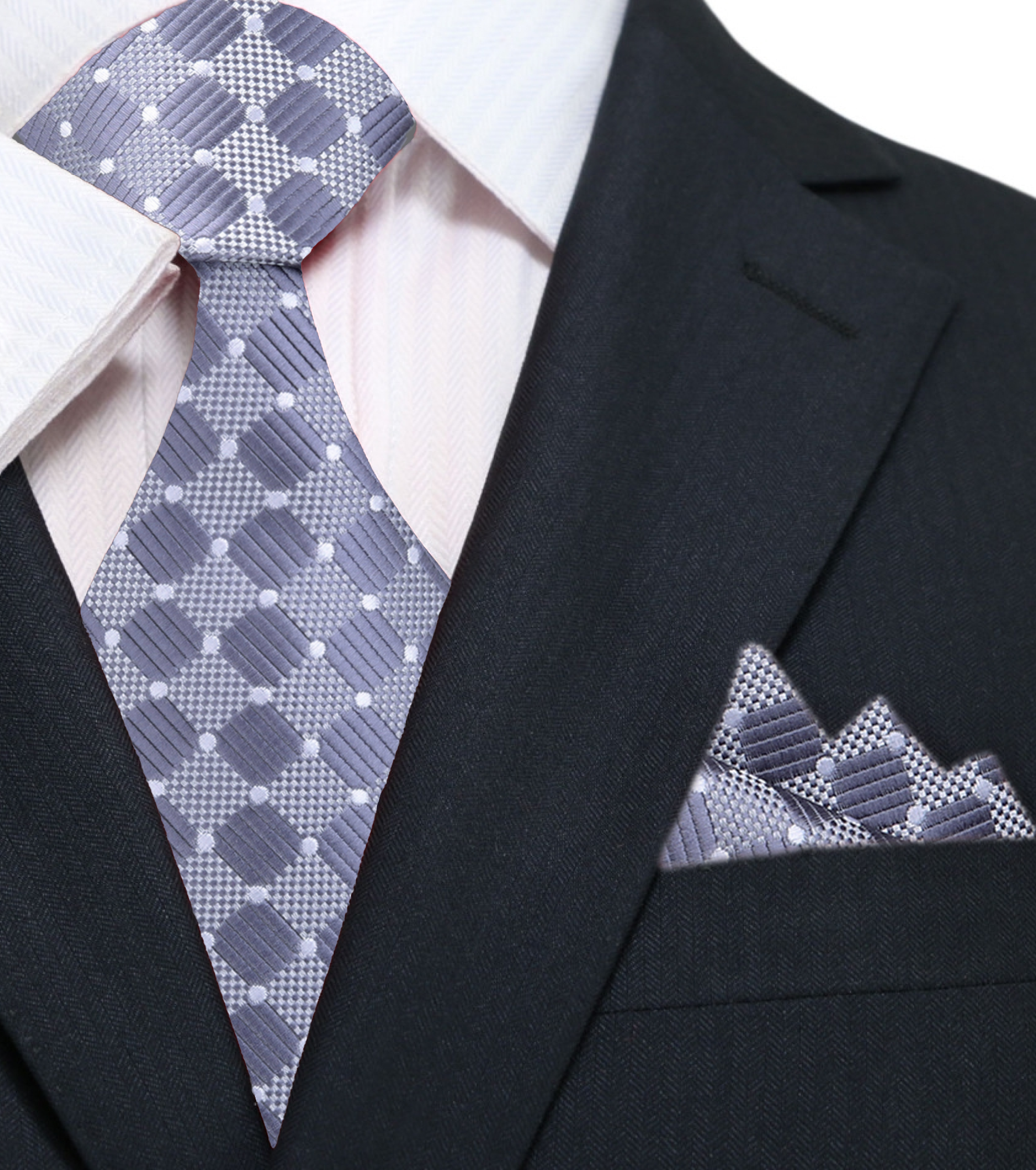 Man wearing the geometric tie and matching pocket square at a wedding