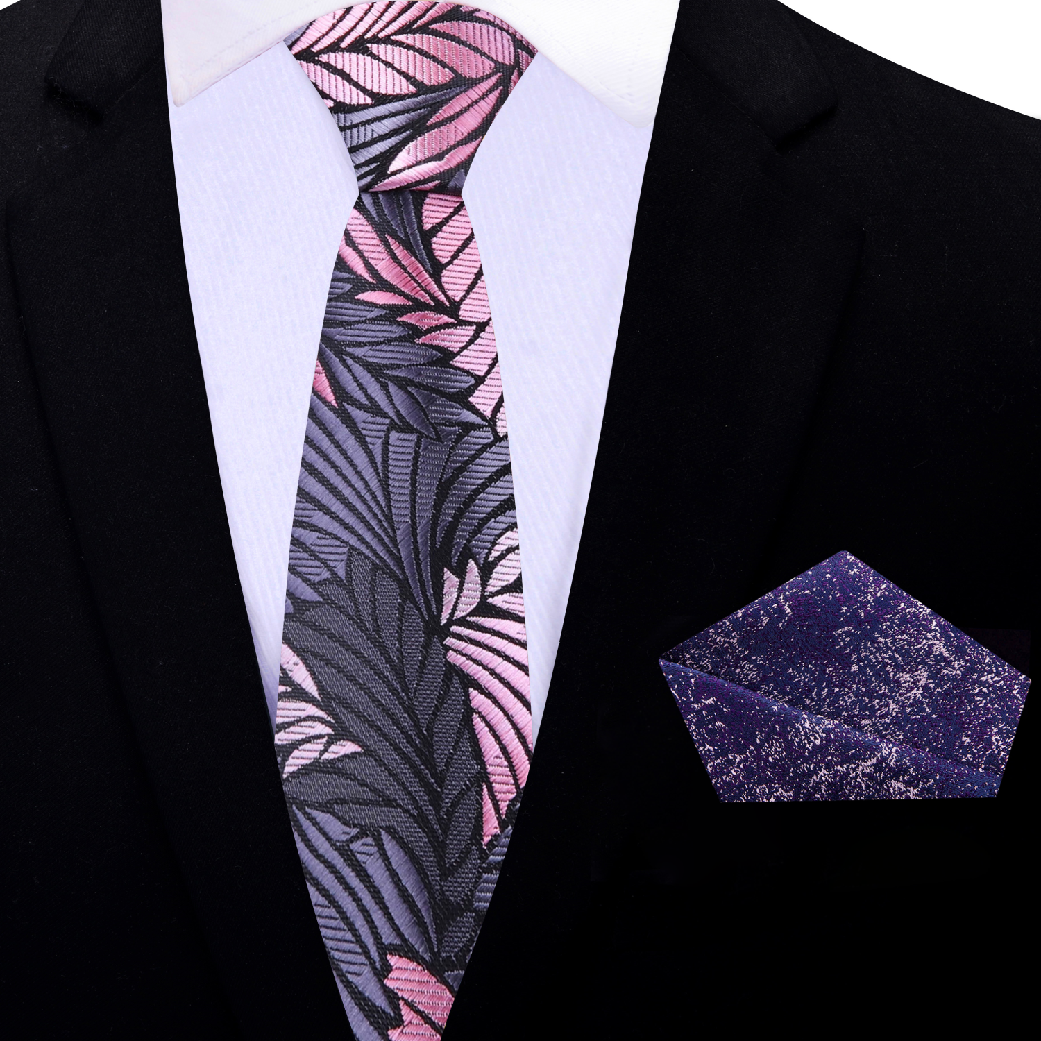 Fashionable man pairing silk necktie with a white dress shirt and pocket square