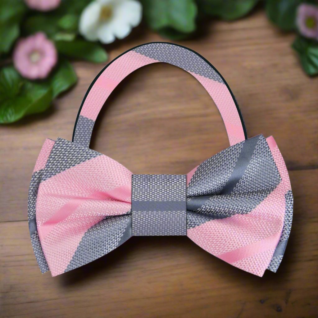 Elegant grey and pink striped silk bow tie styled with a white dress shirt for weddings